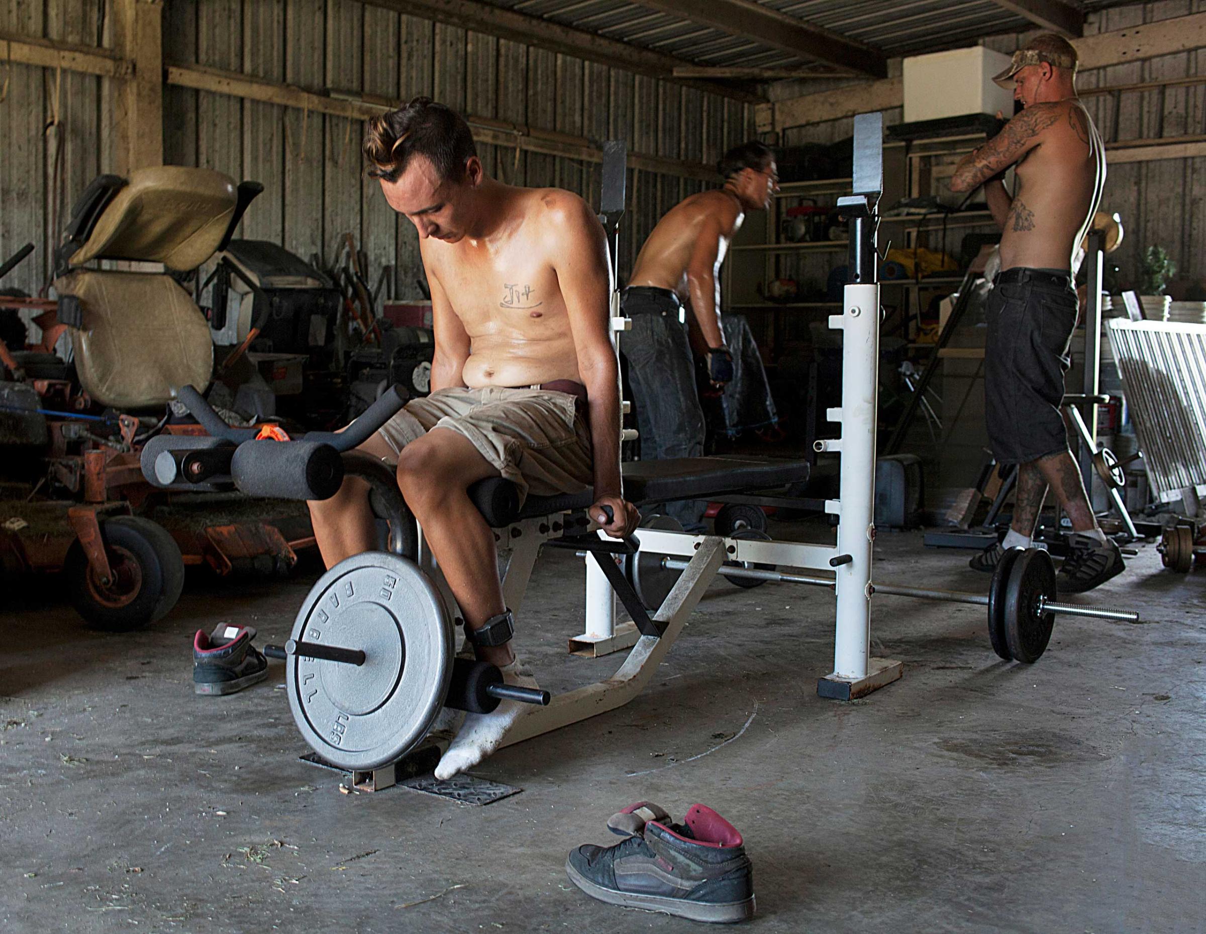 Matt exercising in the back shed in the village with David and Lee."Growing up with my mom was enough, I'm ready to move on. All I did was go to school and take care of the house. It was like living in boot camp. She was the one that called the cops on me in order to protect her job or so she said."