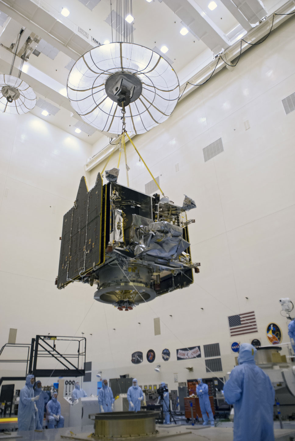 A crane lifts the MAVEN spacecraft inside the Payload Hazardous Servicing Facility on Aug. 3, 2013.
