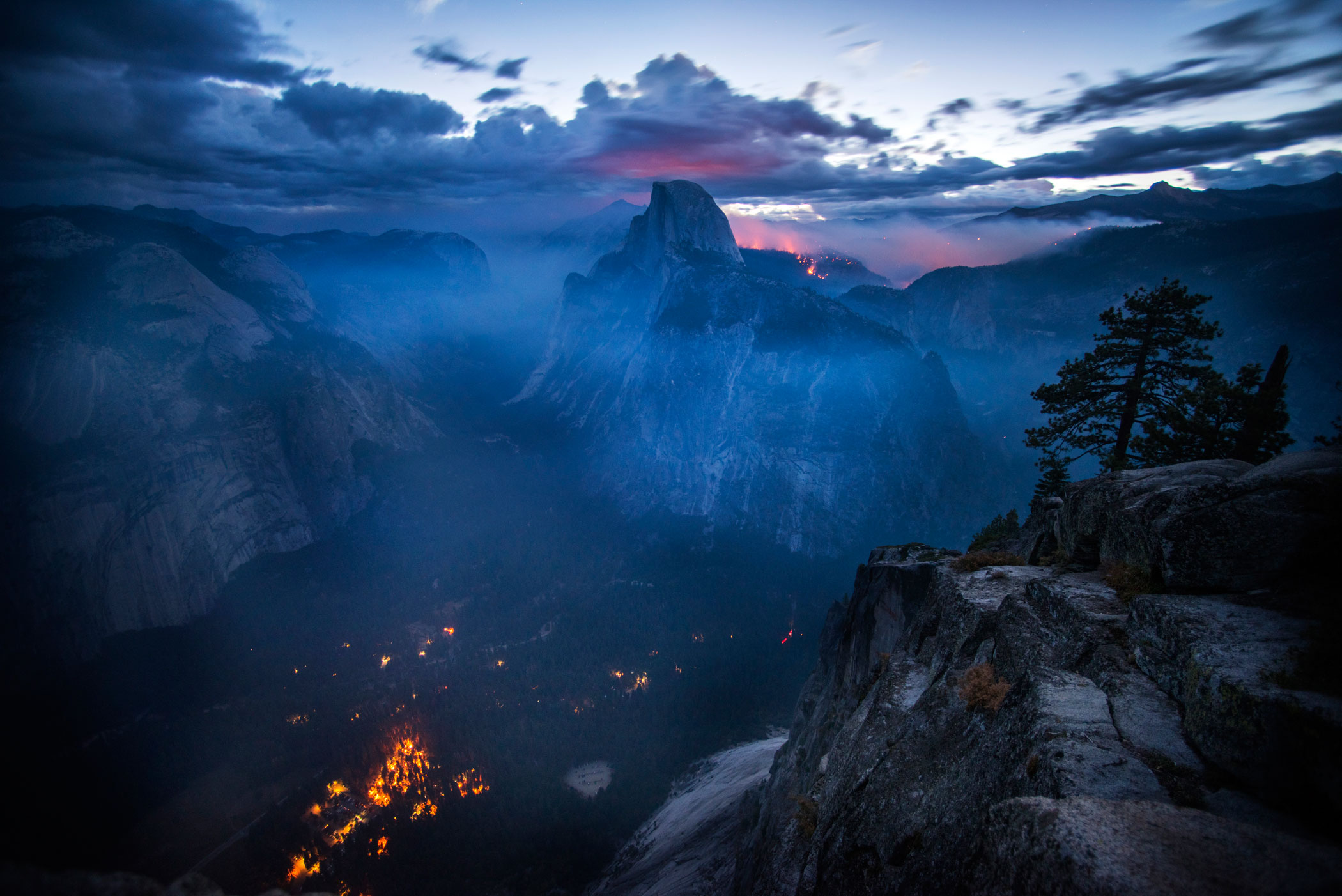 The Meadow Fire burns at dawn near Half Dome in Yosemite National Park early Monday September 8, 2014. As of Wednesday the fire had burned over 4,500 acres and was 10% contained.