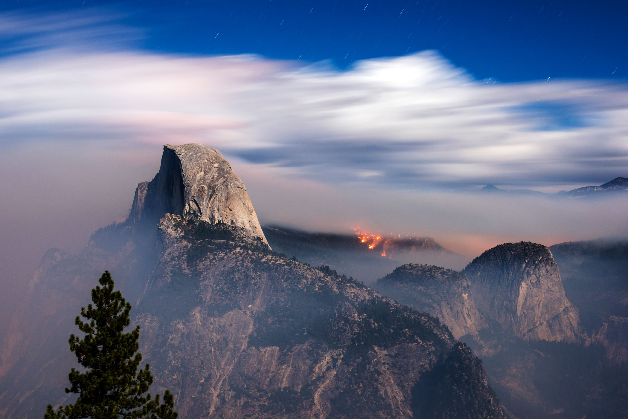 The Meadow Fire burns overnight near Half Dome in Yosemite National Park early Monday September 8, 2014. As of Wednesday the fire had burned over 4,500 acres and was 10% contained.