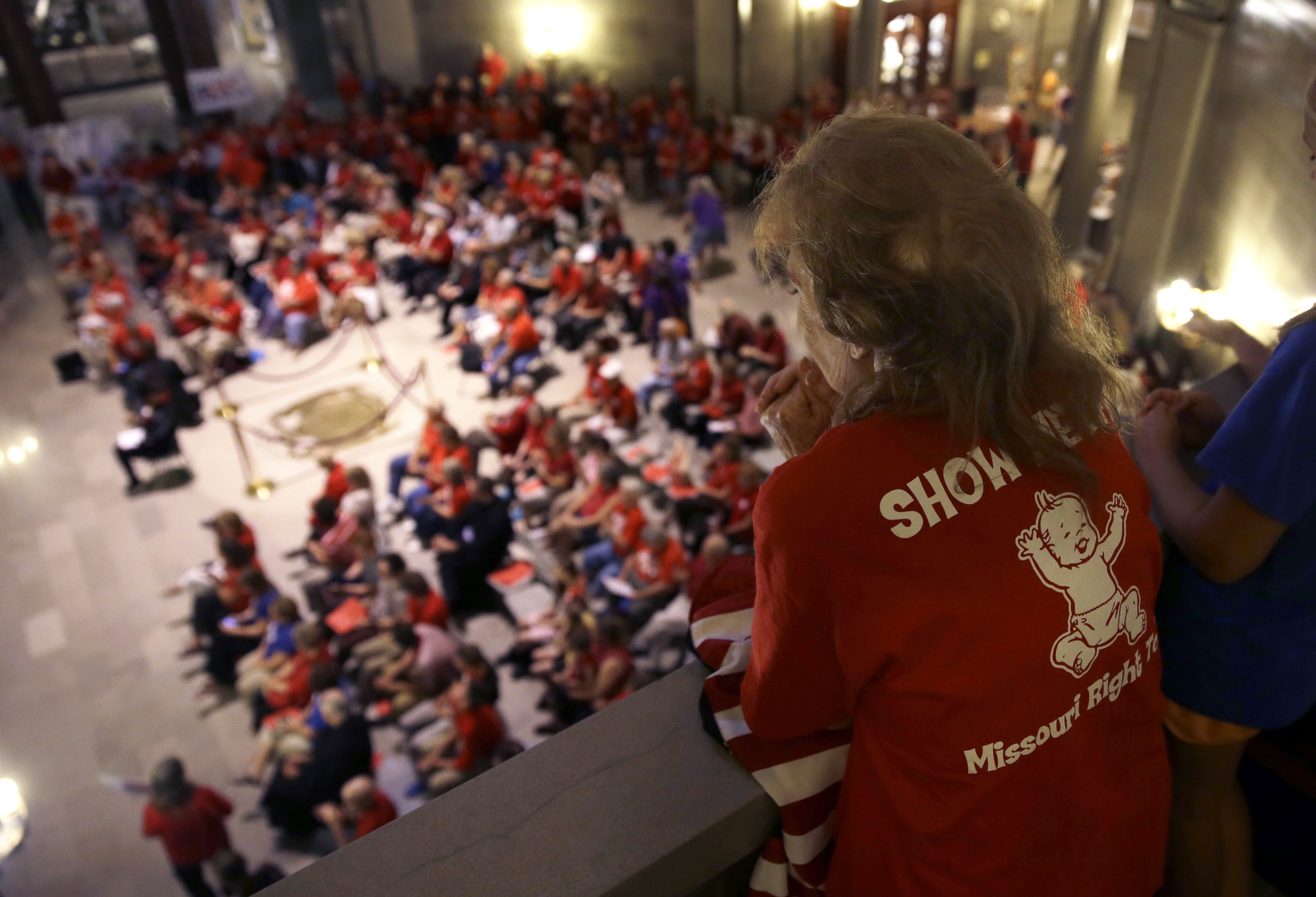 Elizabeth War looks over a gathering of her fellow abortion opponents in the Missouri Capitol rotunda in Jefferson City, Mo. on Sept. 10, 2014. (Jeff Roberson—AP)