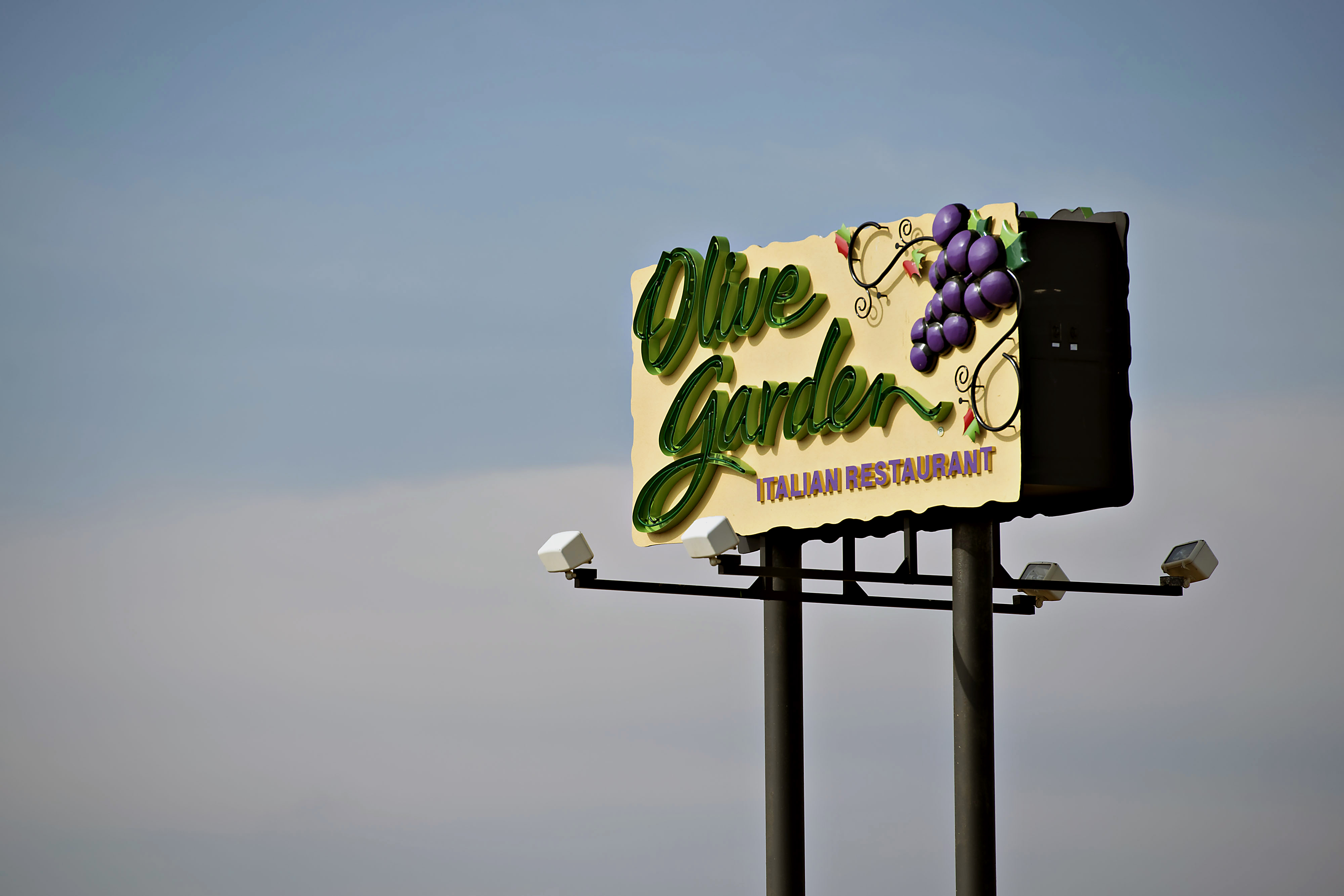 Darden Restaurants Inc. Olive Garden signage is displayed outside of a location in Peoria, Illinois, U.S., in March 2014. (Bloomberg via Getty Images)