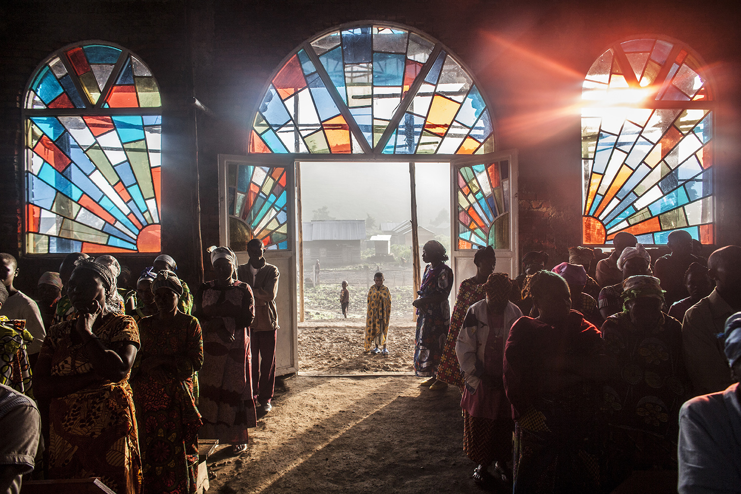 Congolese attend a Sunday church service in the village of Kitshanga, in Masisi territory on March 9, 2014.
