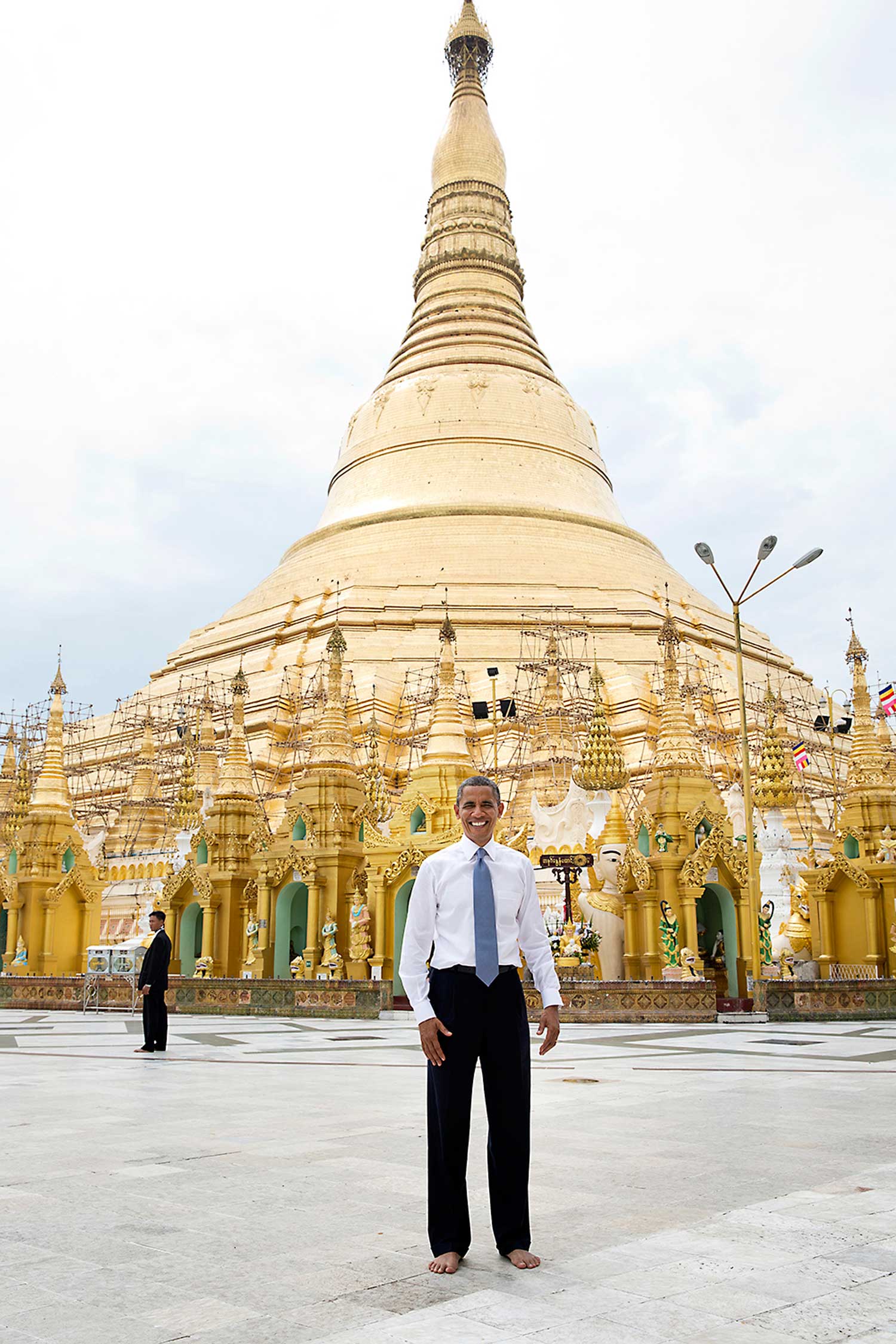 To some, this is a snapshot and doesn't belong in this gallery of candid photographs. But to me, it evokes what the trip to Burma was all about. Here is the President of the United States, shoes and socks off in respect, posing as a tourist in front of the oldest pagoda in the world in a country that no U.S. President had ever been able to visit.