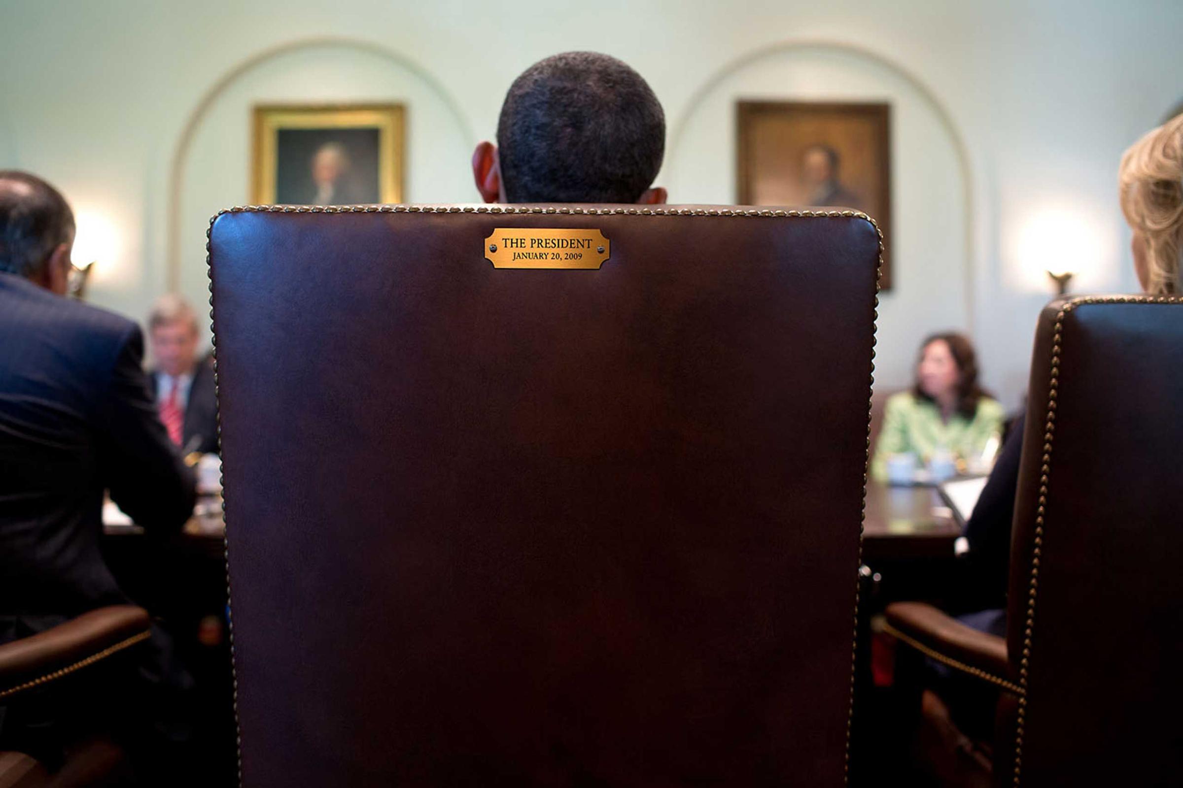 A view from behind of the President as he holds a Cabinet meeting in the Cabinet Room of the White House, July 26, 2012.