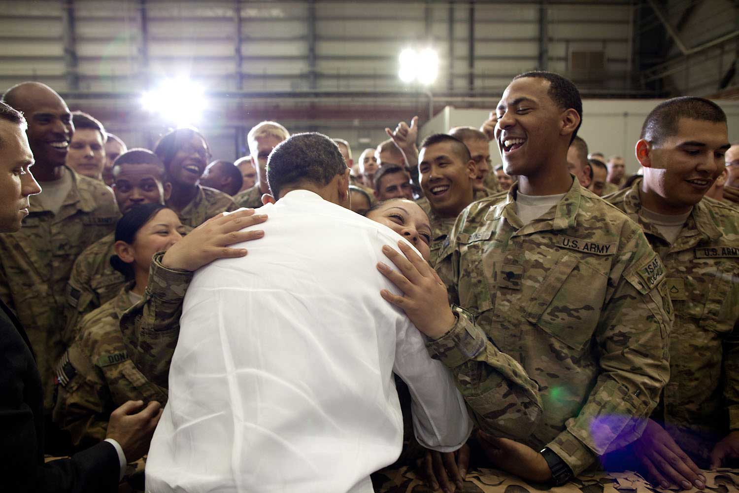 President Obama greets U.S. troops following his remarks during an unannounced trip to Bagram Air Field, Afghanistan, May 1, 2012. The President made three trips around the ropeline to try and shake every hand.