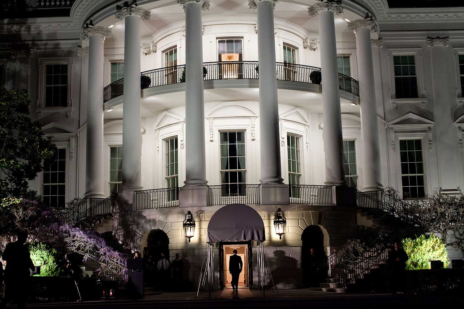 President Obama enters the White House at the South Portico following his arrival aboard Marine One on the South Lawn, March 30, 2012. The President returned from a trip to Vermont and Maine.