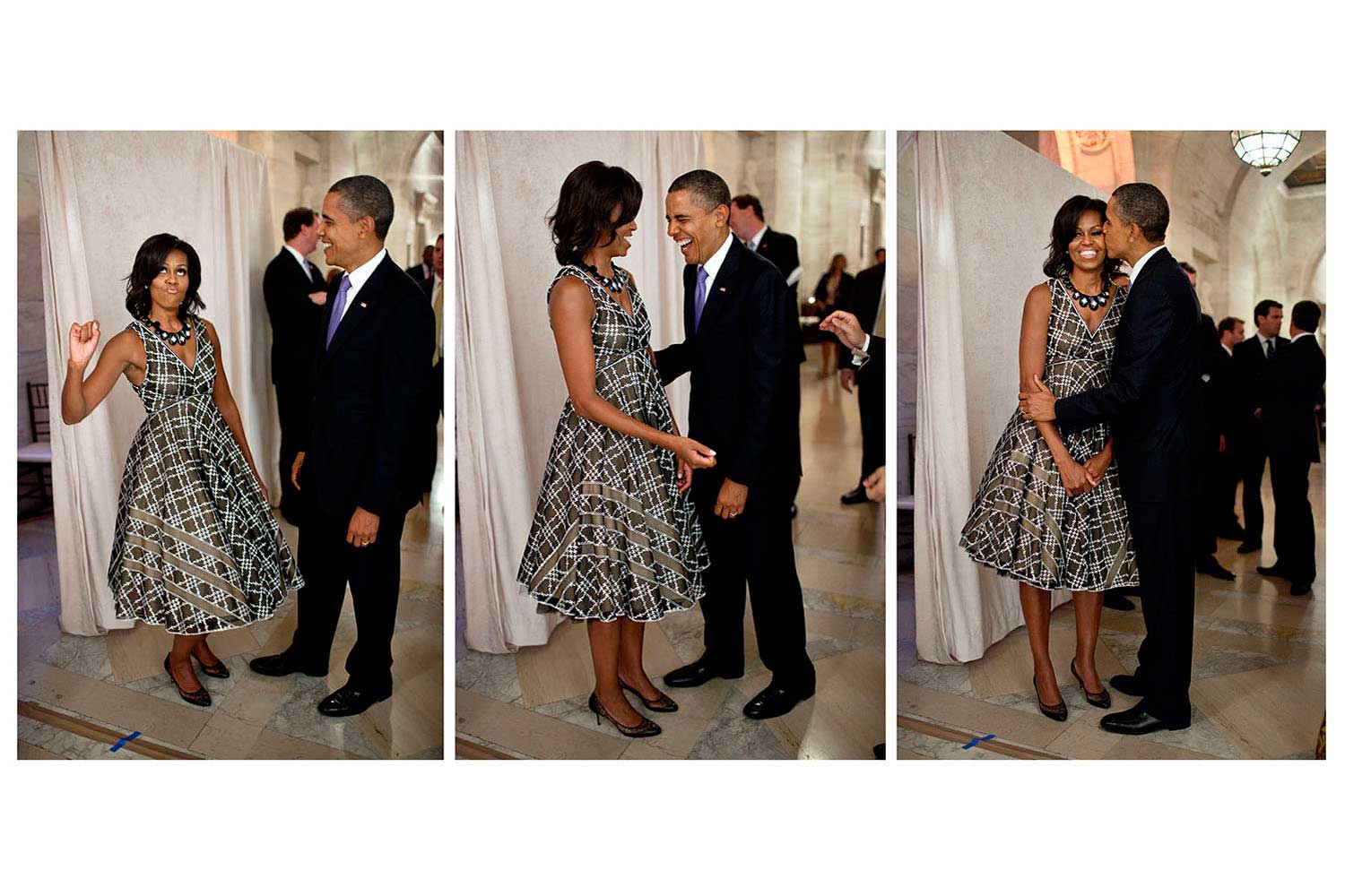 President Obama laughs as The First Lady pretends to be a majorette before addressing the United Nations General Assembly Reception at the New York Public Library, in N.Y., N.Y., Sept. 21, 2011. A marching band performed at the reception before the President and Mrs. Obama addressed the crowd.
