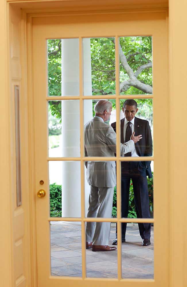 President Obama talks with Vice President Biden on the Colonnade outside the Oval Office, June 20, 2011.
