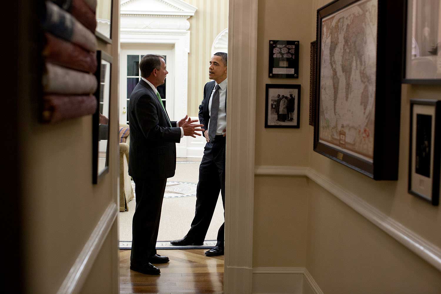 President Obama and House Speaker John Boehner talk in the Oval Office following a late night meeting on the budget, April 6, 2011.