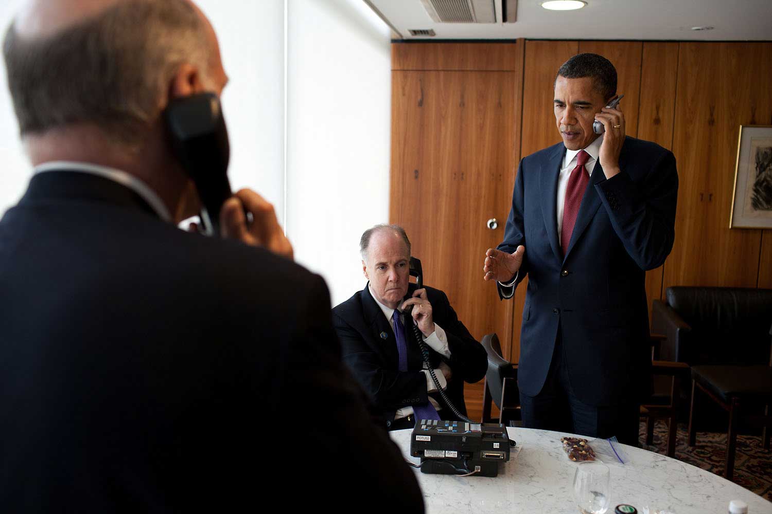 "The President gives the final authorization for the armed forces of the United States to begin a limited military action in Libya in support of an international effort to protect Libyan civilians during a conference call in Brazil, March 19, 2011."