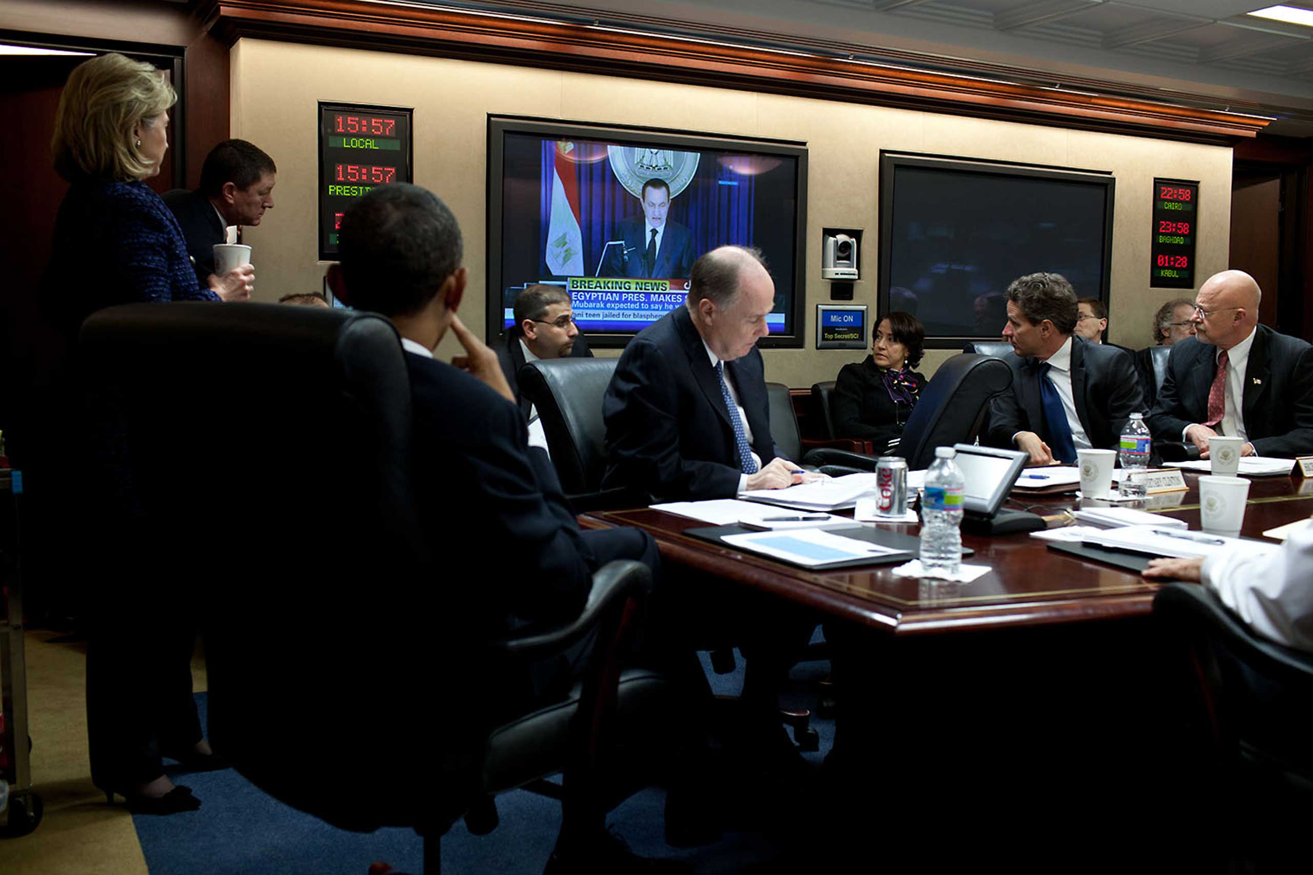 The President and his national security team were gathered in the Situation Room to discuss the developing events in Egypt on Feb. 1, 2011. An aide rushed in to say that Egyptian President Hosni Mubarak was making a live televised statement, so the feed was patched in so everyone could watch Mubarak. In the midst of days of protests calling for his ouster, Mubarak in this statement said he would step down at the end of his term.