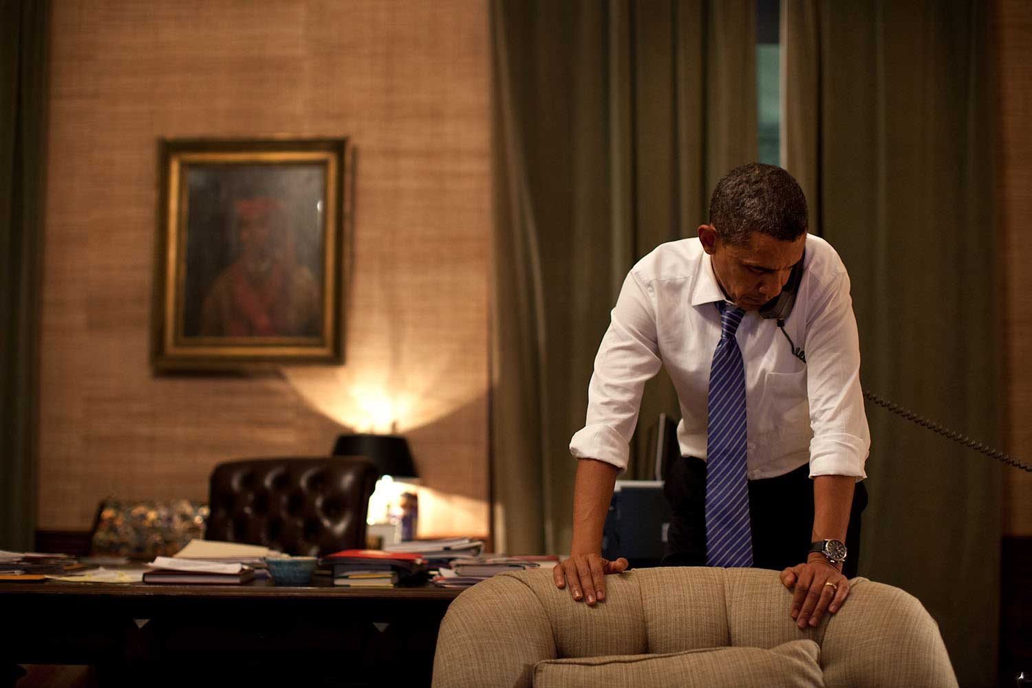 Late at night in the Treaty Room office in the White House residence, Nov. 23, 2010, the President talks on the phone with President Lee Myung-bak of South Korea after North Korea had conducted an artillery attack against the South Korean island of Yeonpyeong.