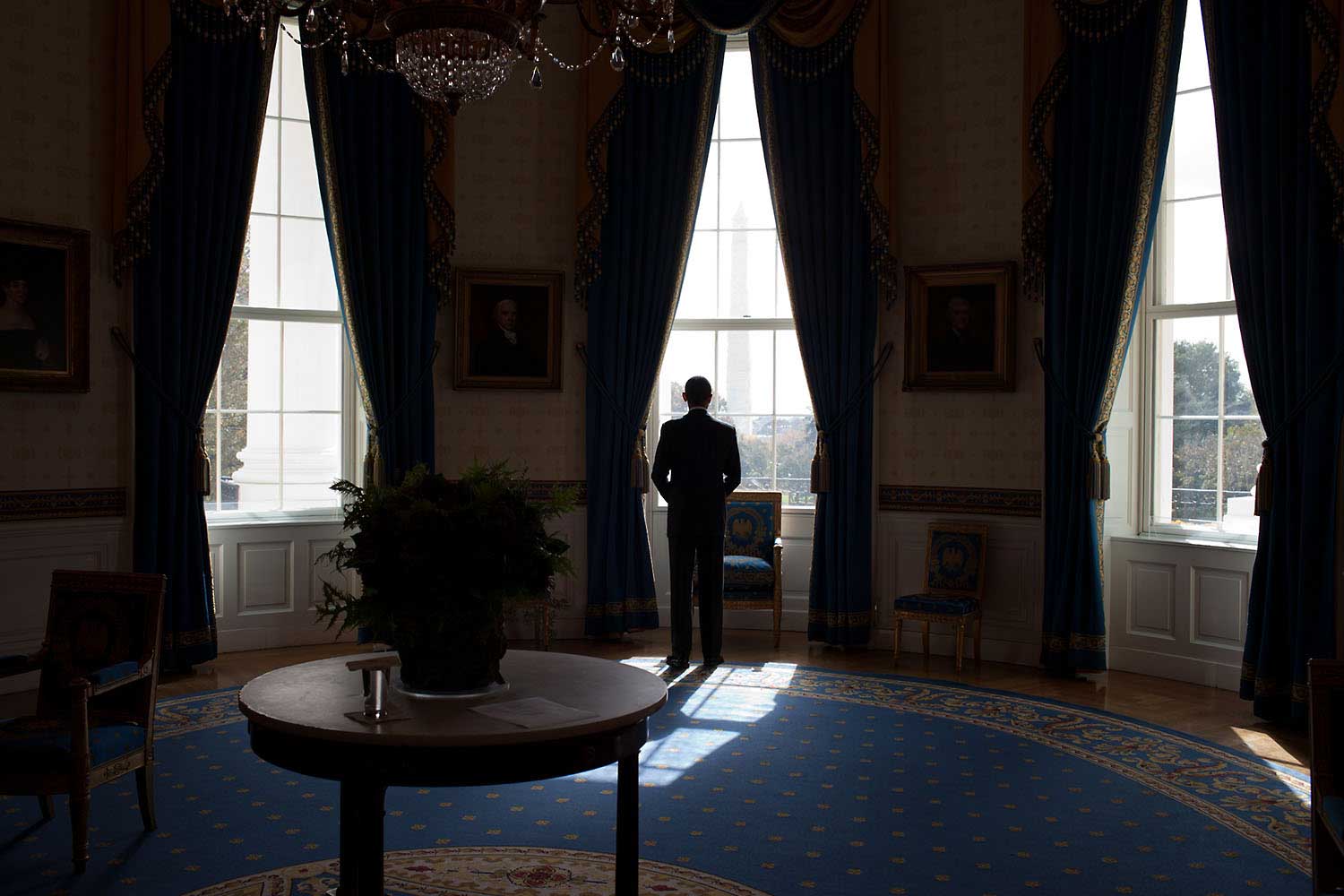 The day after the mid-term election, the President waits in the Blue Room of the White House before facing the press at a news conference in the East Room, Nov. 3, 2010.