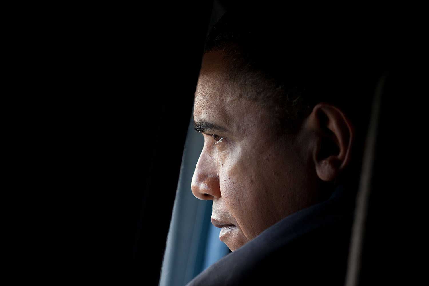 President Obama looks out the window aboard the Marine One helicopter before speaking at Hampton University commencement in Armstrong Stadium, Hampton, Va. May 9, 2010.