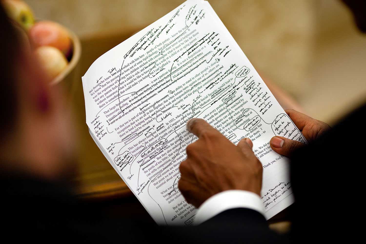 “The President works on his health care speech with his chief speechwriter, Jon Favreau, in the Oval Office, Sept. 9, 2009. I noticed his handwritten edits and made this close-up. It’s a simple picture but it tells volumes about how involved he is in writing and editing his speeches.”