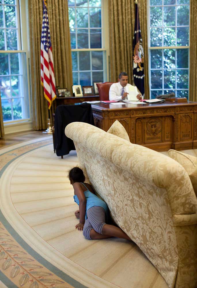 “I was sitting in the reception area outside the Oval Office on Aug. 5, 2009, when Sasha walked by and headed to the Oval. I suspected something was up, so I followed her. Sasha then crawled into the office, hiding behind the sofa, and when she reached the far end, jumped up and yelled, trying spook her dad.”
