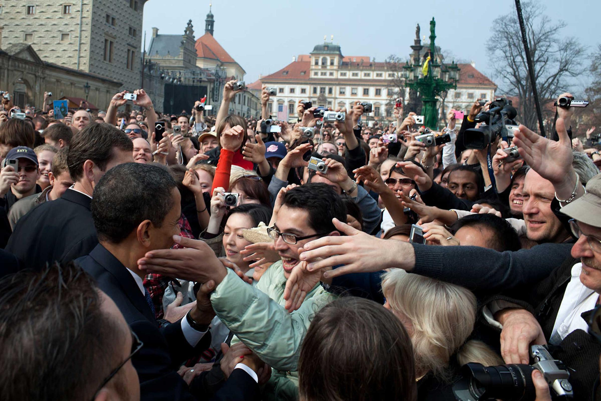 President Barack Obama is greeted by a large crowd following his Prague speech in Hradcany Square, April 5, 2009.