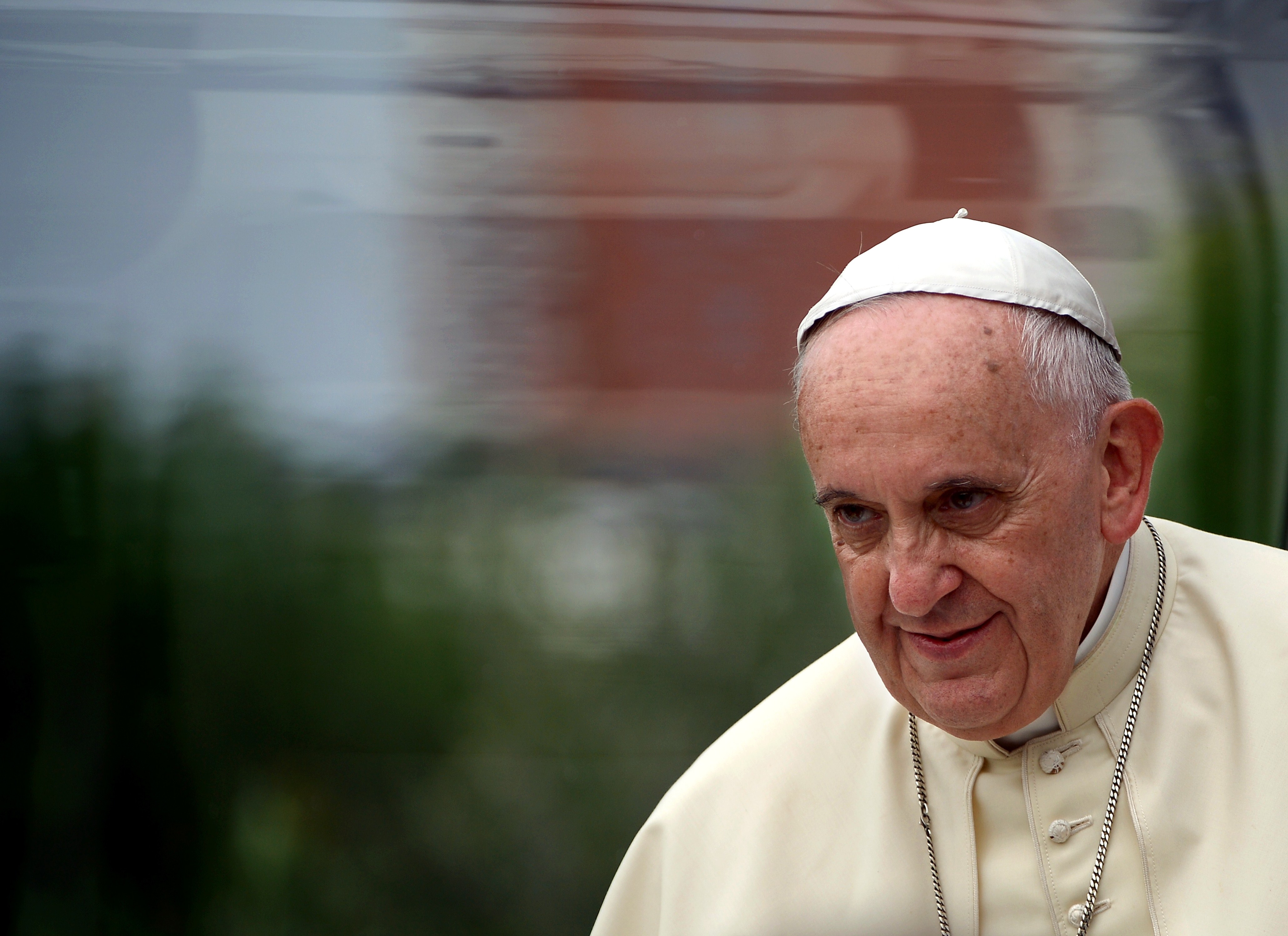 Pope Francis arrives with his popemobile at the Catholic University in Tirana, on September 21, 2014.  