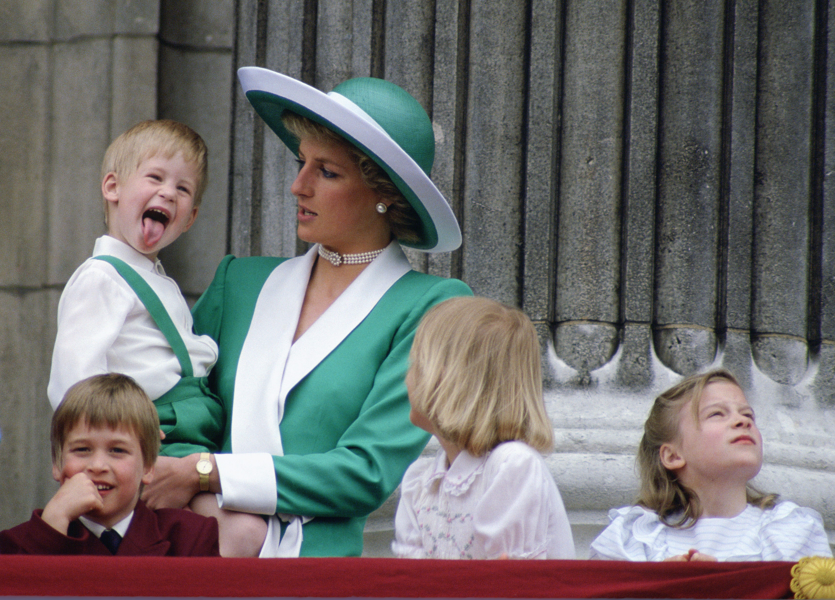 Prince Harry sticks his tongue out at the Trooping The Colour ceremony at Buckingham Palace on June 11, 1988.