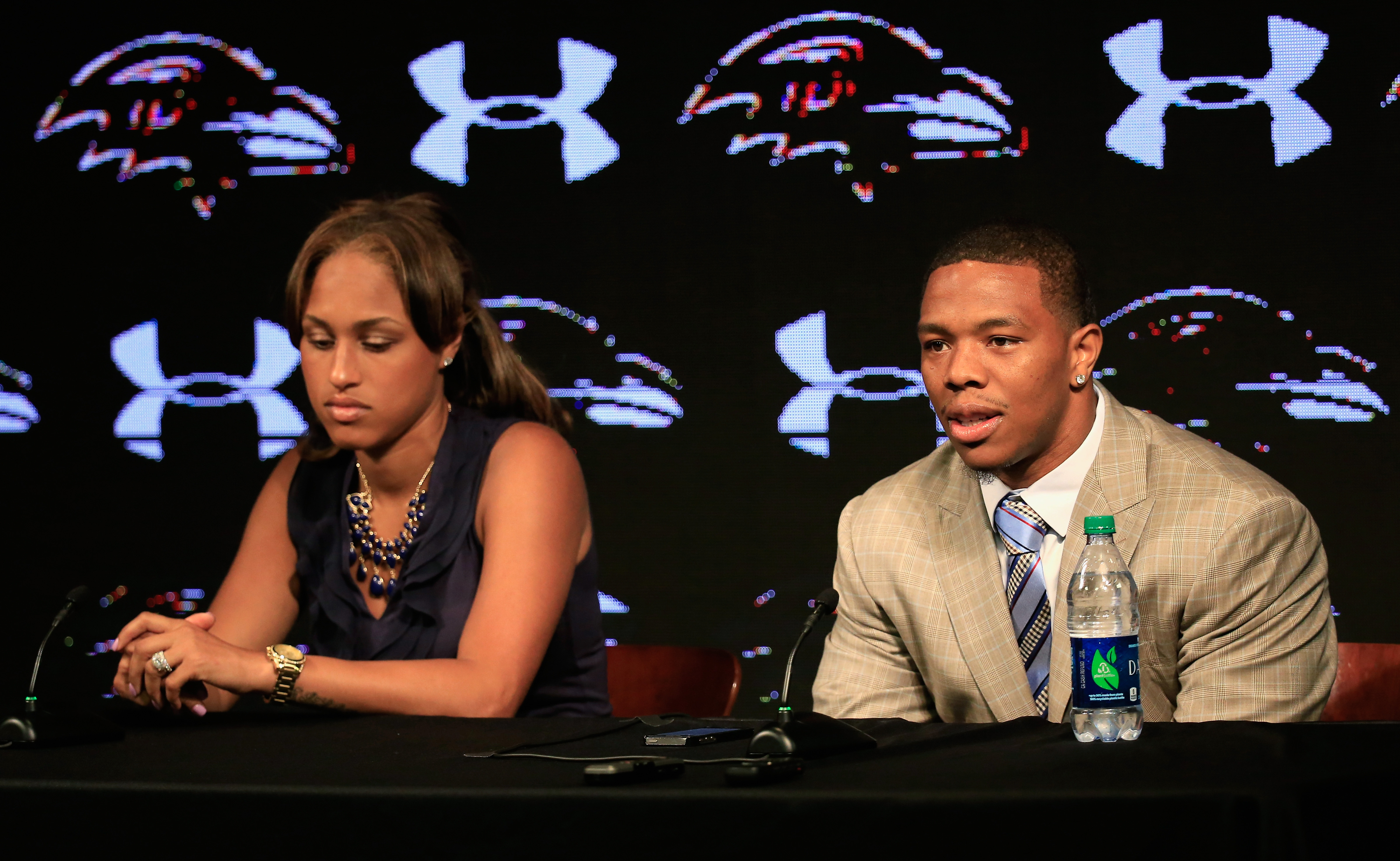 Running back Ray Rice of the Baltimore Ravens addresses a news conference with his wife Janay at the Ravens training center on May 23, 2014 in Owings Mills, Maryland. (Rob Carr&amp;mdash;Getty Images)
