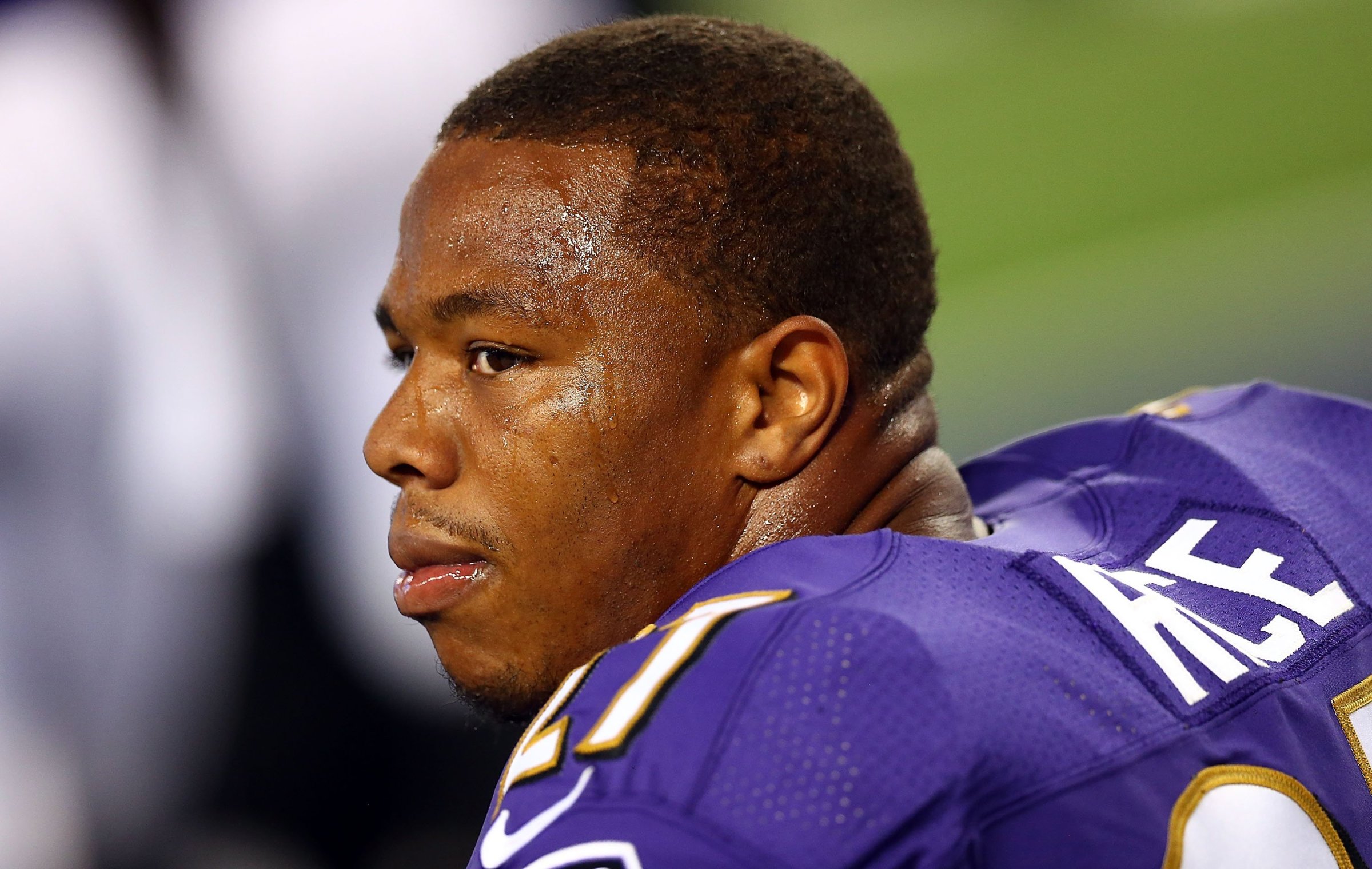 Ray Rice of the Baltimore Ravens sits on the bench against the Dallas Cowboys in the first half of their preseason game on Aug. 16, 2014 in Arlington, Texas.