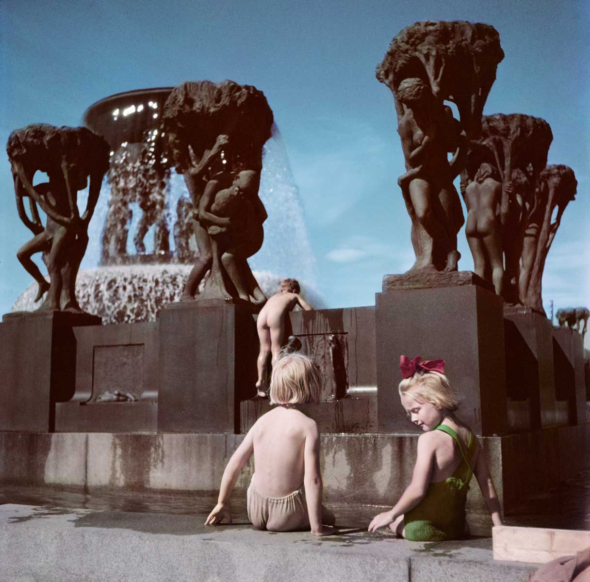 Children play in the Gustav Vieglund Sculpture Park, Oslo, Norway, 1951.