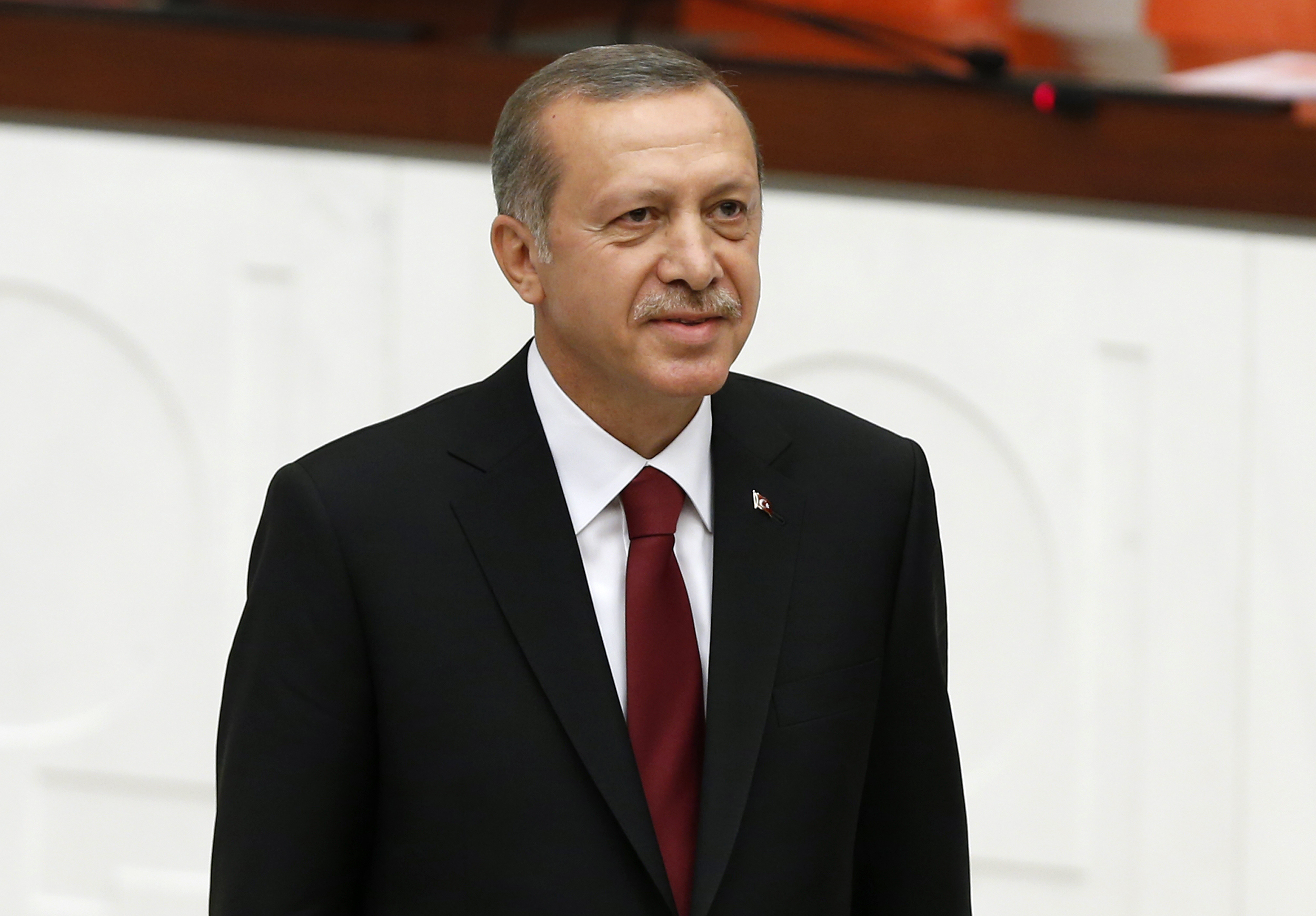 Turkey's new President Erdogan attends a swearing in ceremony at the parliament in Ankara