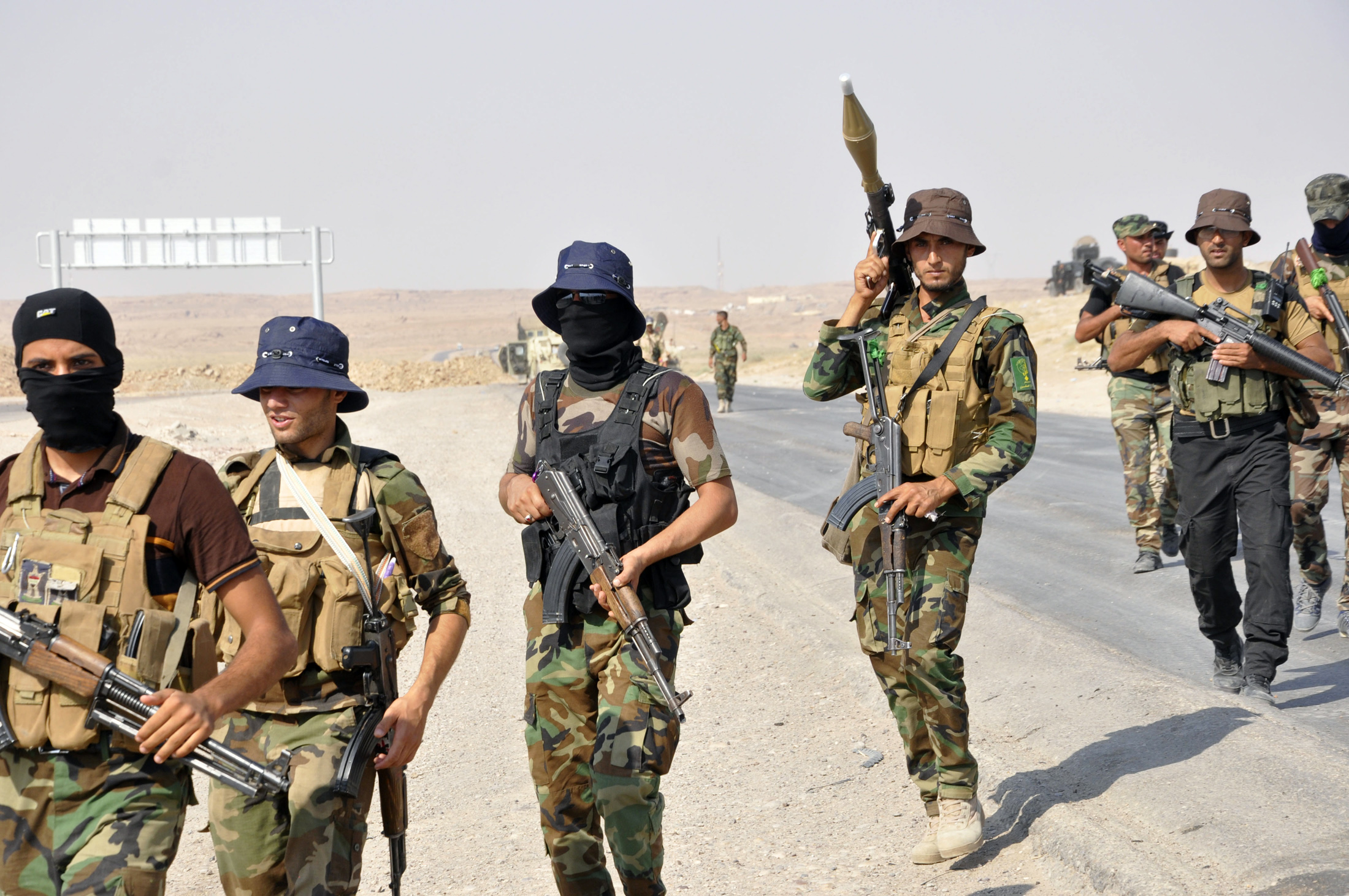 Iraqi security forces and Shi'ite militias advance towards town of Amerli from their position in the Ajana