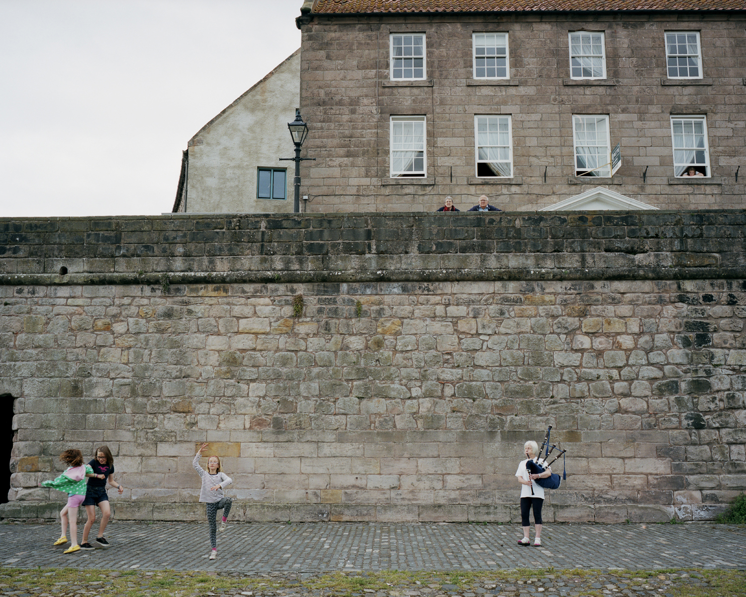 Iris playing bagpipes outside Berwick-Upon-Tweed’s town walls, which were built in the early 14th century under Edward I, following his capture of the city from the Scots.