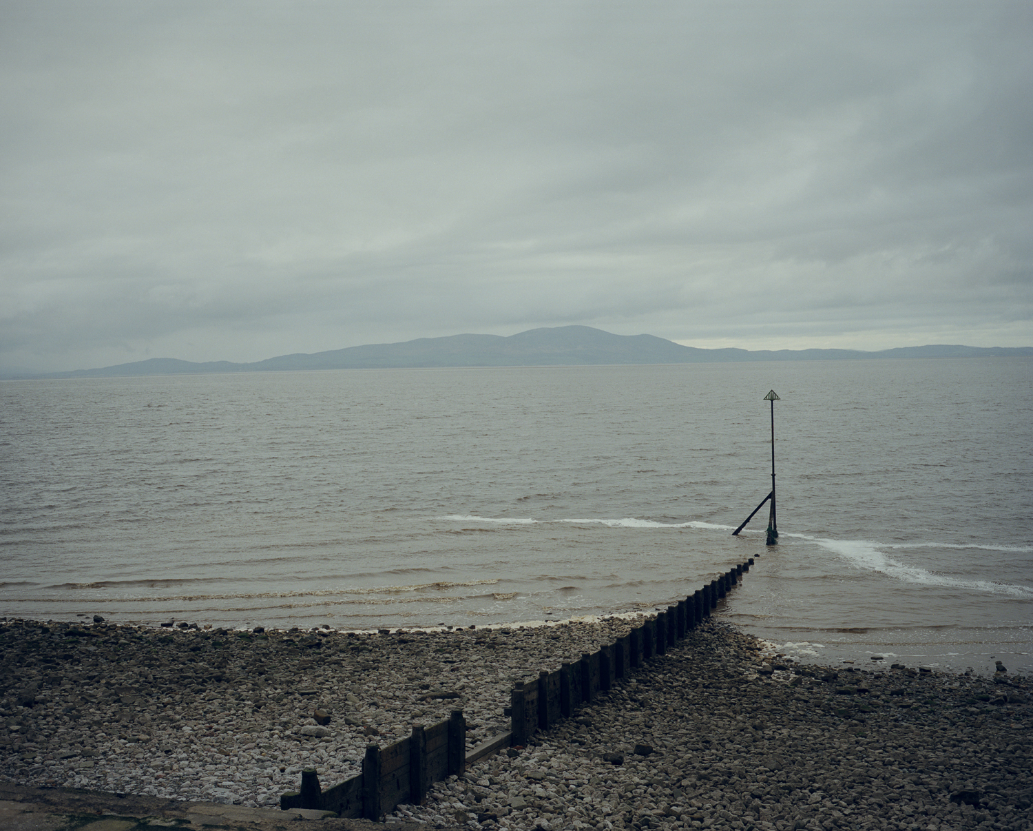 Looking at the hills of Dumfriesshire in Scotland from Cumbria, England, across the Solway Firth.