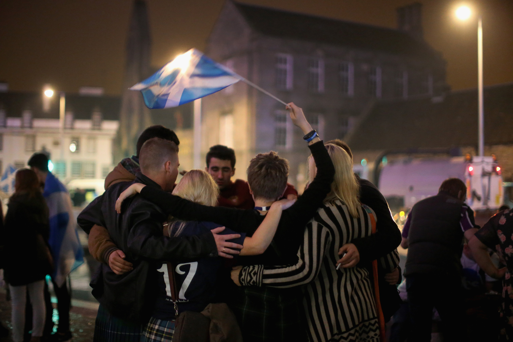 Yes vote campaigners console themselves outside the Scottish Parliament building after the people of Scotland voted no to independence on Sept. 19, 2014 in Edinburgh, Scotland. (Christopher Furlong—Getty Images)