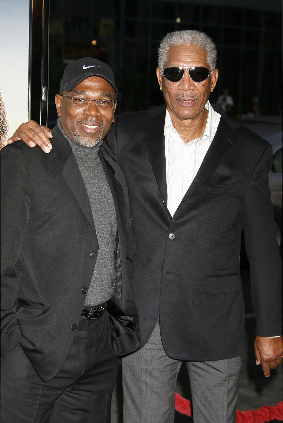Morgan Freeman's son Alfonso (left) posed for Red's mugshot.