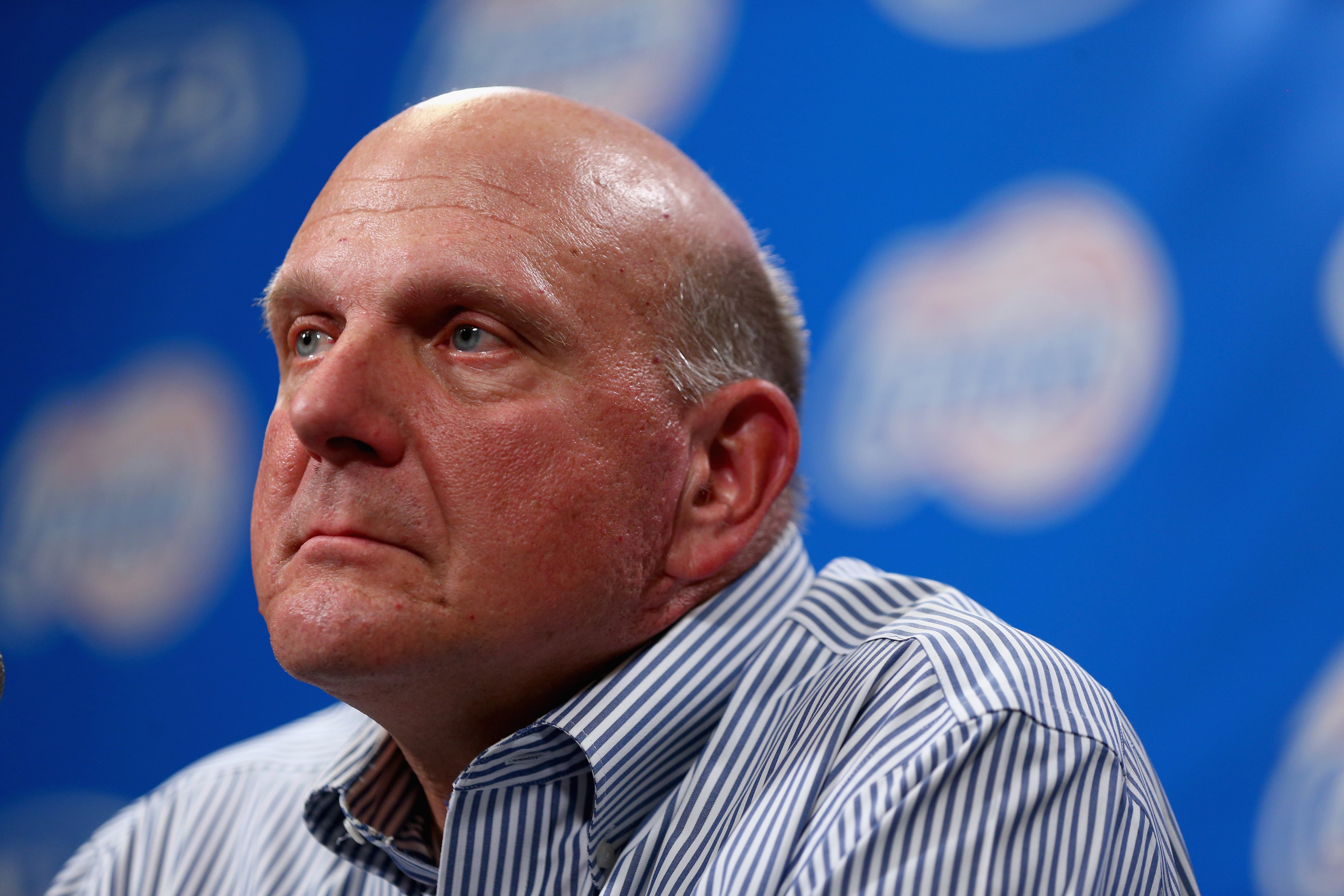 The new owner of the Los Angeles Clippers, Steve Ballmer, addresses the media after being introduced for the first time during the Los Angeles Clippers Fan Festival on August 18, 2014, in Los Angeles (Jeff Gross—Getty Images)
