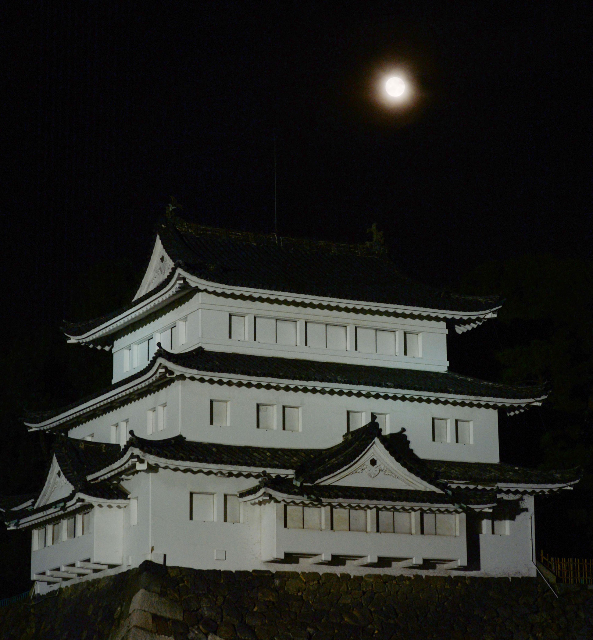The harvest supermoon is seen over the Northwest Turret of Nagoya Castle in the city of Nagoya, Japan, on Sept. 8, 2014.
