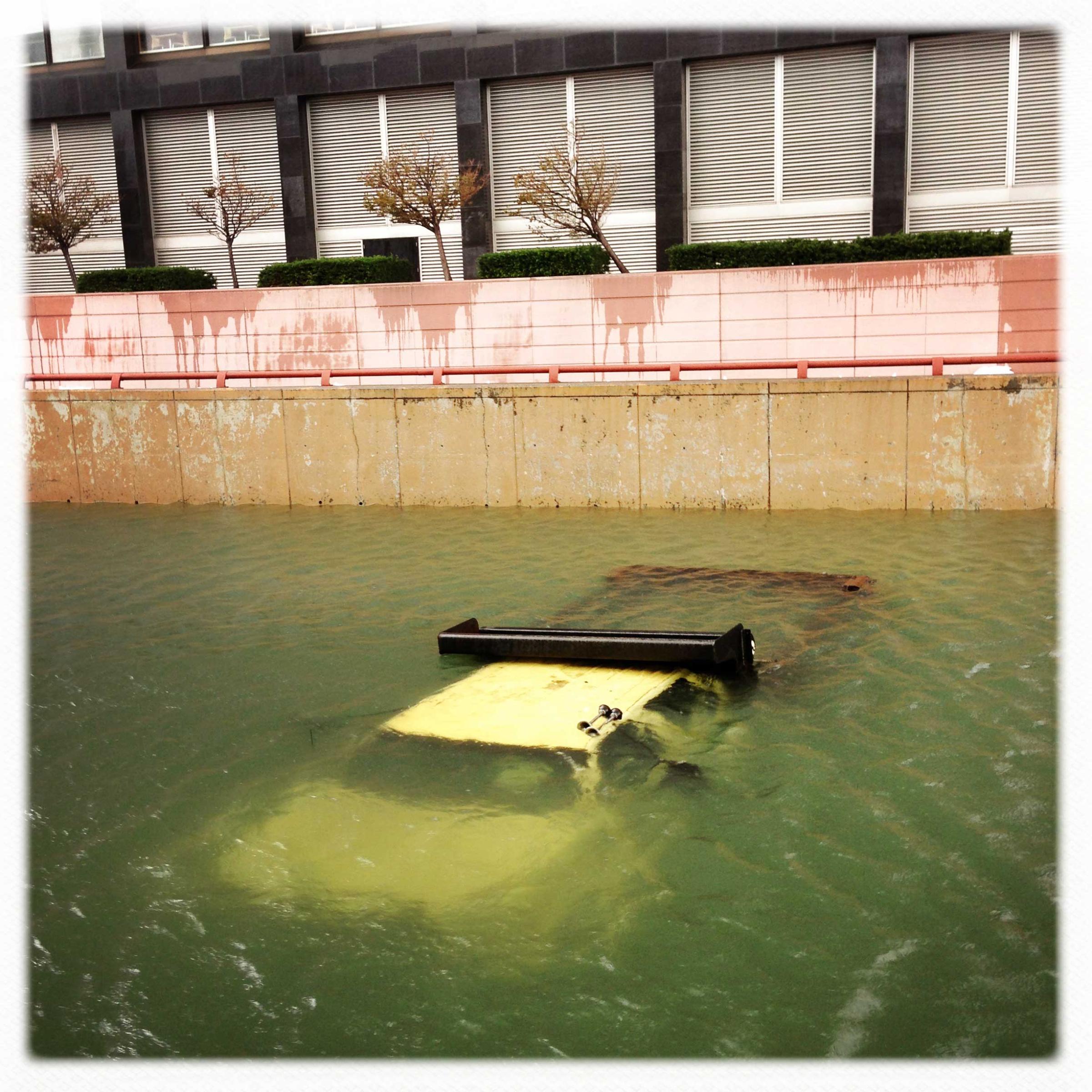A truck submerged in water at the entrance to the Brooklyn-Battery tunnel in Lower Manhattan