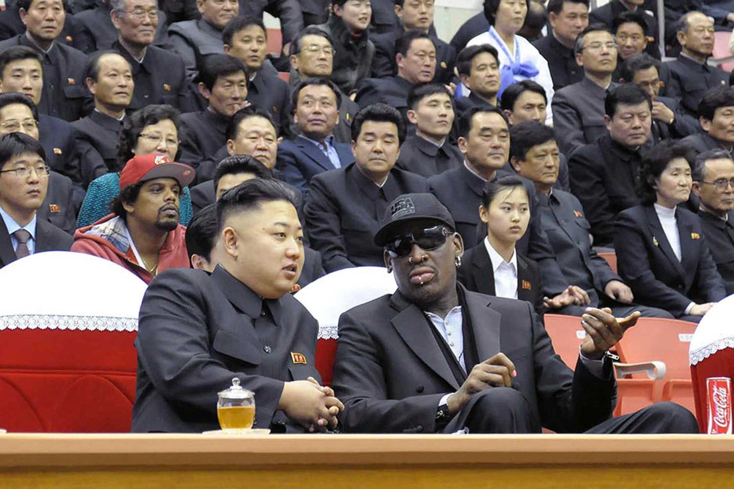 North Korean leader Kim Jong-Un and former NBA star Dennis Rodman speak at a basketball game in Pyongyang on Feb. 28, 2013. (KCNA—AFP/Getty Images)