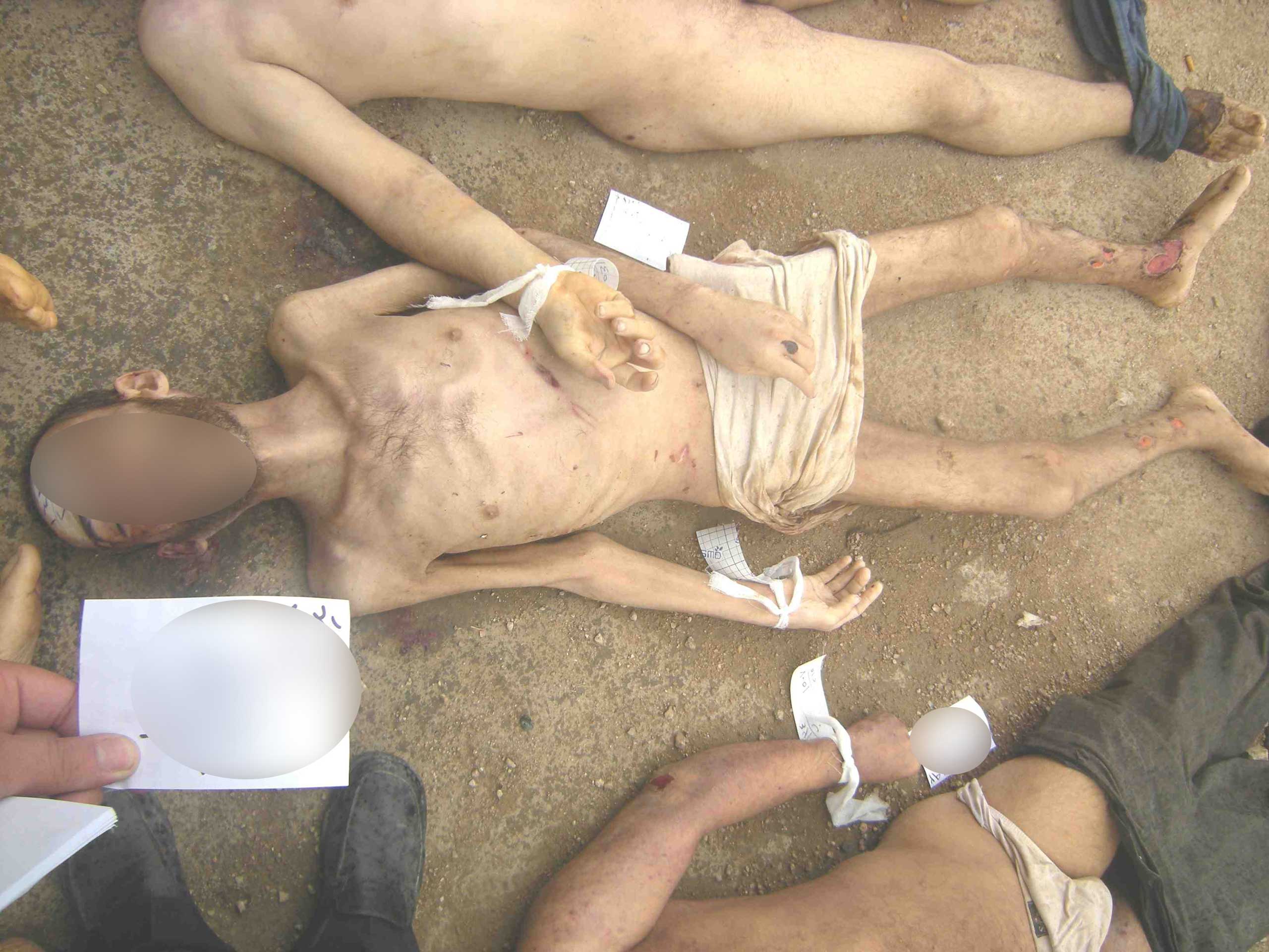 This undated photograph made available following the release of a January 2014 report by the Carter-Ruck law firm, commissioned by the Qatari government, shows evidence of alleged torture and execution at the secret jails of Syria's president, Bashar al-Assad.