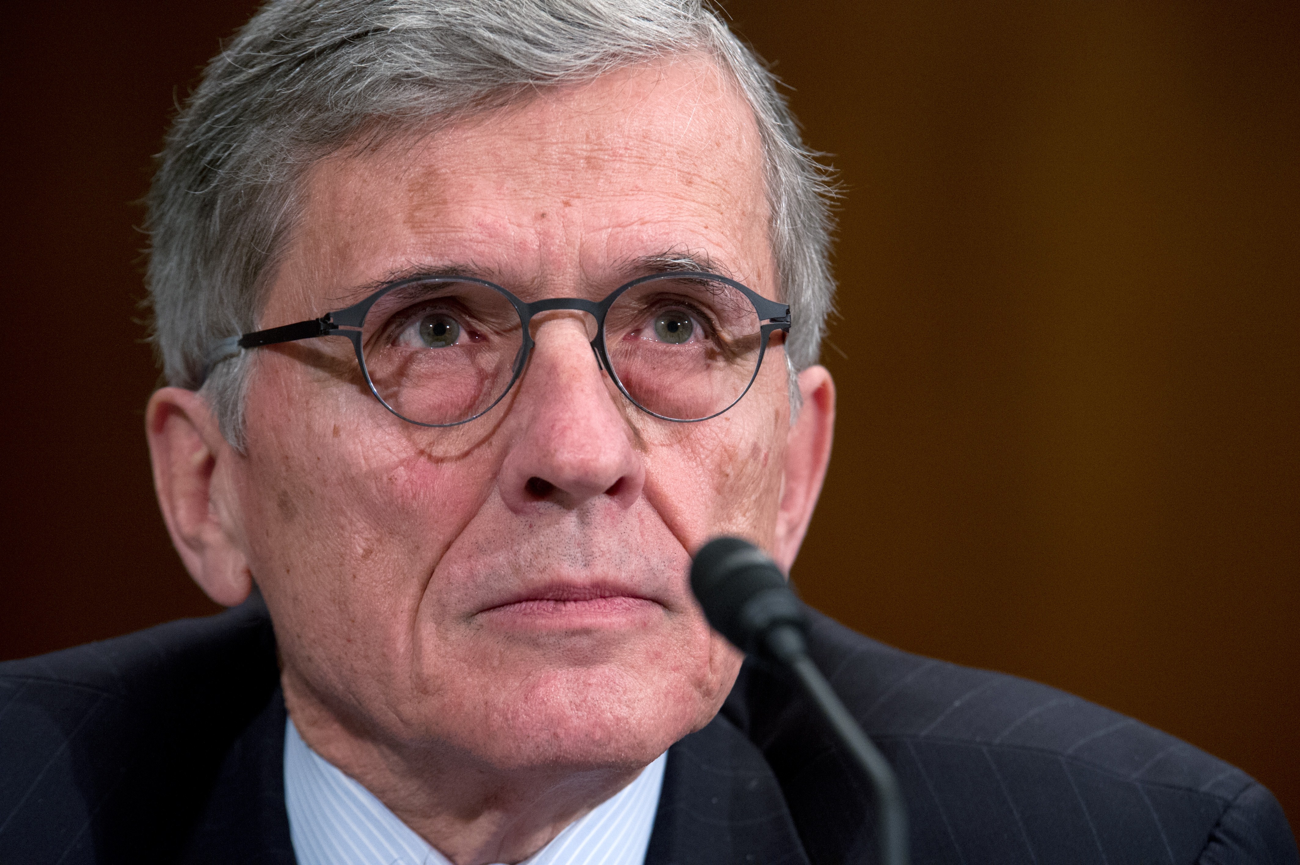 FCC Chairman Tom Wheeler gives testimony before the Financial Services and General Government Subcommittee hearing on "Review of the President's FY2015 funding request and budget justification for the Federal Communications Commission (FCC)."on March 27, 2014 on Capitol Hill in Washington, D.C. (Karen Bleier—AFP/Getty Images)