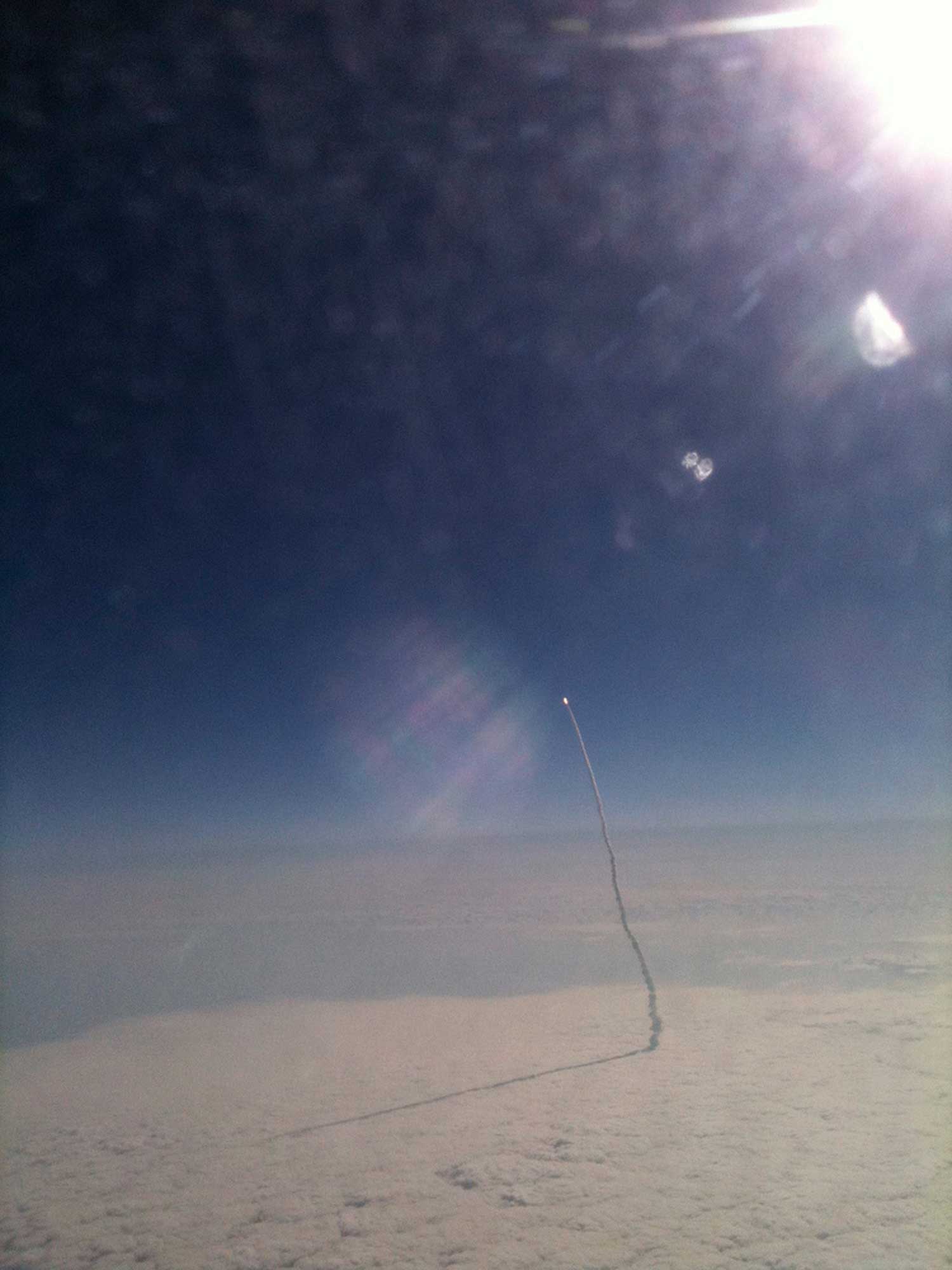 Stefanie Gordon. Shuttle launch. May 16, 2011
                              
                              The photo was an unexpected hit that I took from almost 35,000 ft. over Florida, flying from New York City to Palm Beach with—of all things my—iPhone 3GS, and tweeted it out upon landing. I didn't realize the impact of the photo or the rounds it was making in social media until a few hours later when I looked at my Twitter mentions and all the personal messages I was receiving on Facebook. Next thing I knew, I was being interviewed by media outlets from all over the world, and my photo was on almost every evening news program. I am still in search for that perfect job that many thought would be offered to me after the photo caught fire.