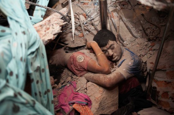 Taslima Akhter. Savar Dhaka, Bangladesh. April 24, 2013. April 24, 2013, still remains fresh in my memory. At 9 AM when I got the news, I rushed to Rana Plaza. That morning I did not understand what a brutal thing had happened, but within hours I grasped the enormity and horror of it. The day passed with many people helping survivors and taking photos. At midnight there were still many people. I saw the frightened eyes of the relatives. Some were crying. Some were looking for their loved ones.Around 2 AM among the many dead bodies inside the collapse, I found a couple at the back of the building, embracing each other in the rubble. The lower parts of their bodies were stuck under the concrete. A drop of blood from the manÕs eye ran like a tear. Since then, this couple remains firmly in my heart. So many questions rose in my mind. What were they thinking at the last moment of their lives? Did they remember their family members? Did they to try to save themselves?I keep asking myself whether the dreams of these people do not matter at all. Are they not worthy of our attention because they are the cheapest labor in the world? I have received many letters from different corners of the world, expressing solidarity with the workers. Those letters inspired me so much, while this incident raised questions about my responsibility as a photographer. My photography is my protest.