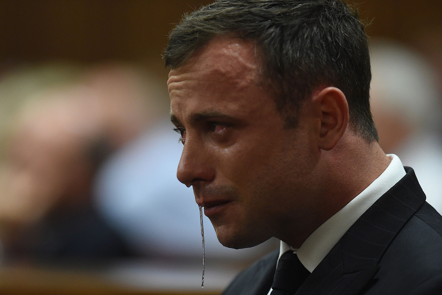 Sept. 11, 2014. An emotional Oscar Pistorius is seen in the dock as  judgment is handed down in his murder trial at the High Court in Pretoria. Pistorius has been acquitted of murdering his girlfriend Reeva Steenkamp.