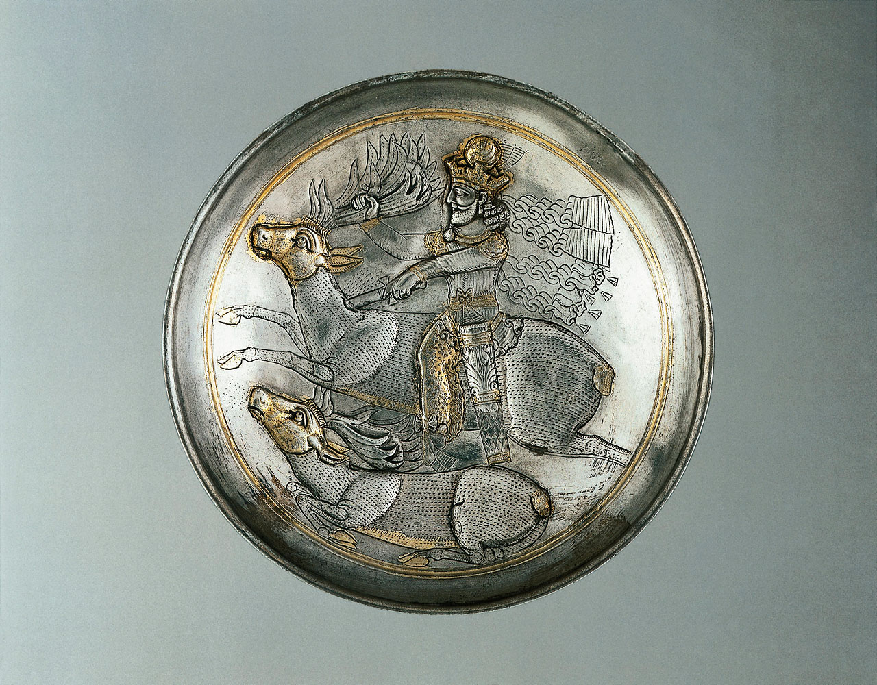 Silver plate, partially gilded, representing king, probably Shapur II hunting deer