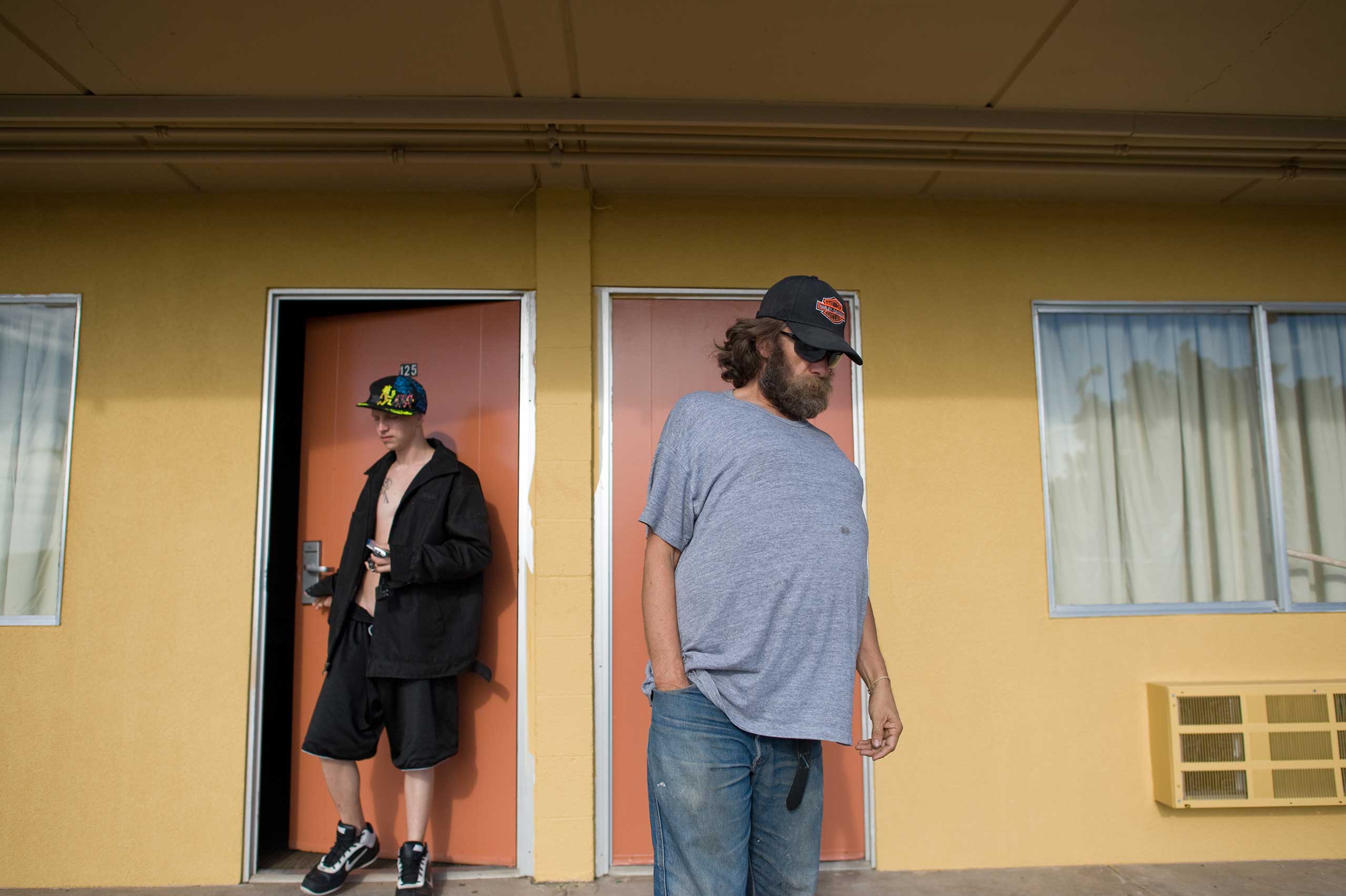 David and his father, Dave, leave a motel.