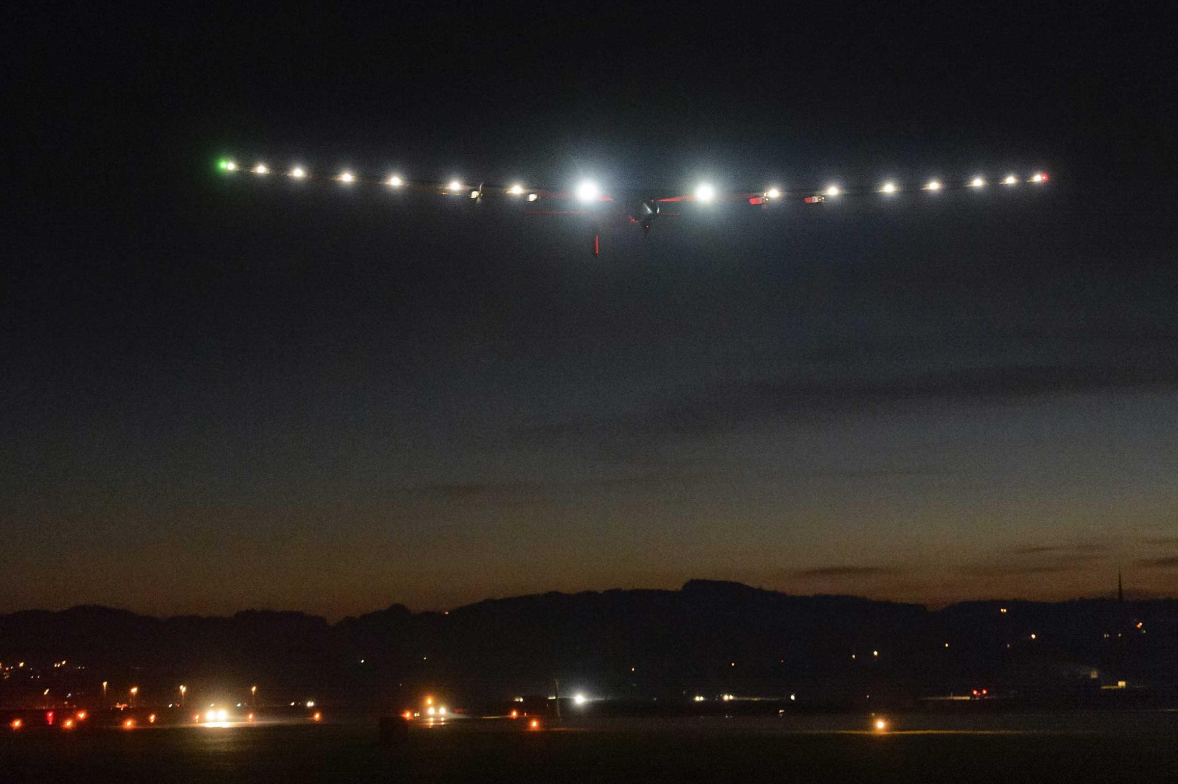 Solar Impulse 2 aircraft flies at night