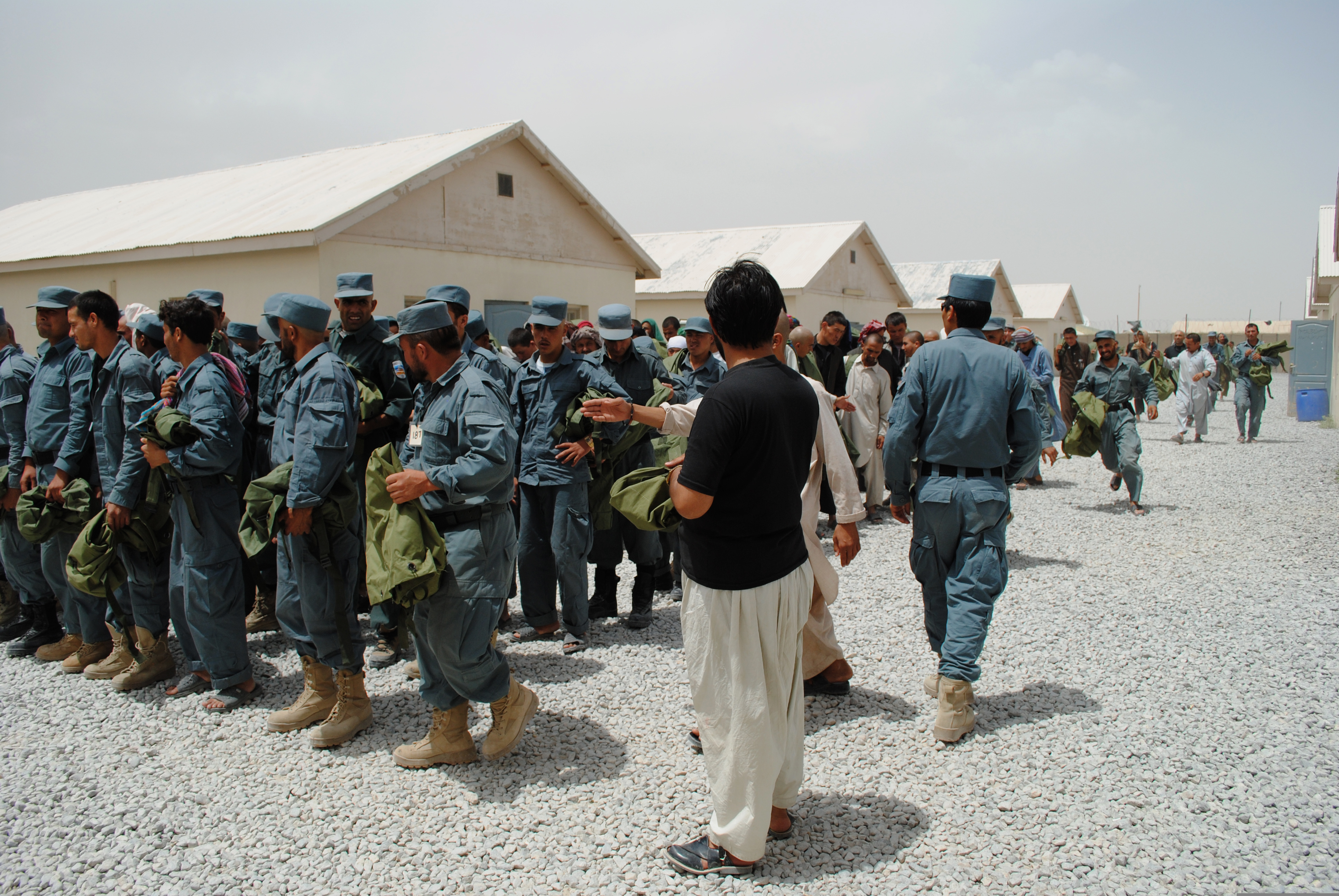 Recruits get ready to become members of the Afghan National Police force in Kandahar province. (DoD photo / TSgt Adrienne Brammer)