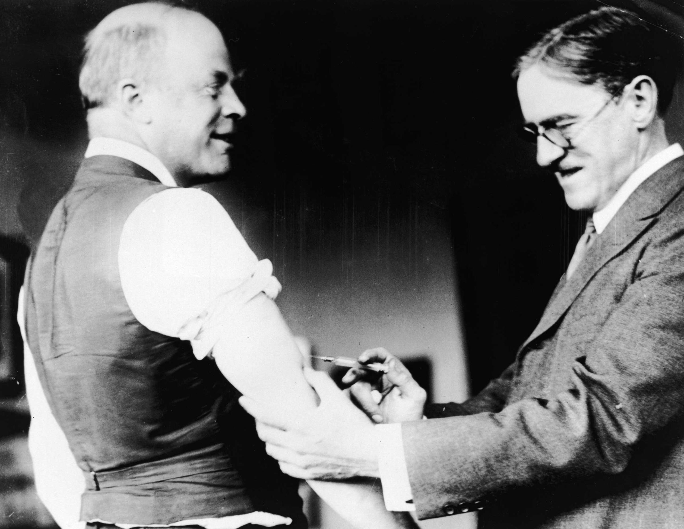 A doctor inoculates Major Peters of Boston against the Influenza virus during the pandemic, 1918.