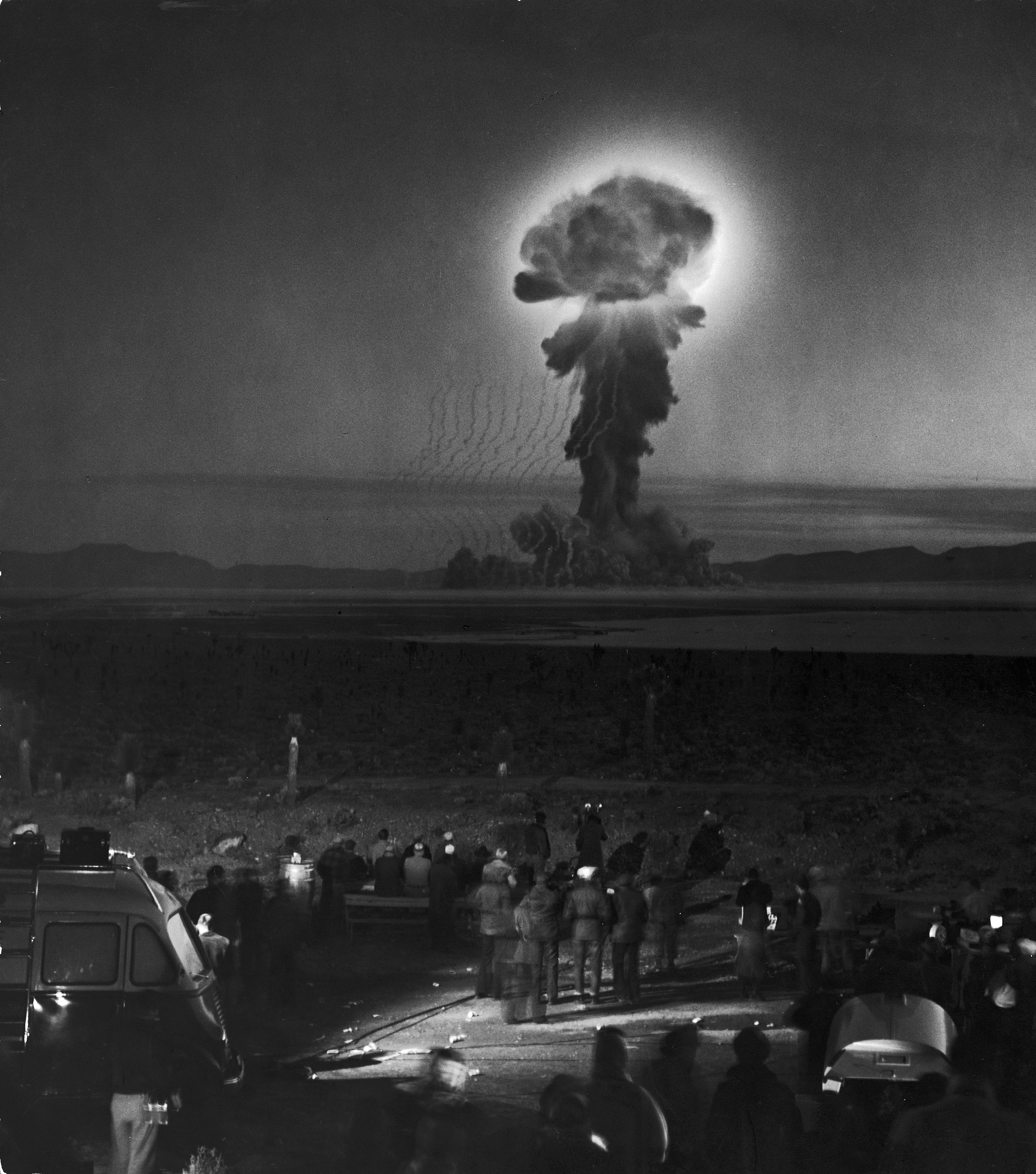 Civil defense officials watch an atomic bomb test, Yucca Flat, Nevada, 1951.