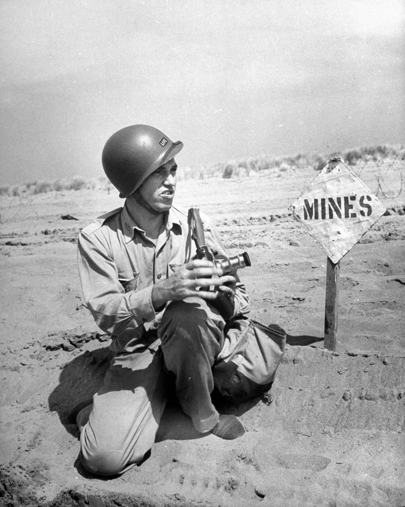 Photographer J.R. Eyerman on assignment during the Allied invasion of Salerno, Italy, 1943.