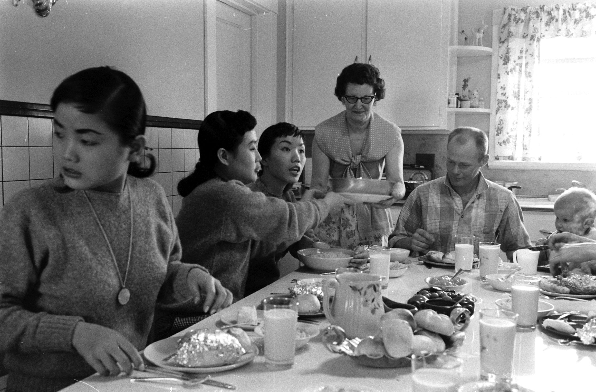 Kim Sisters with their manager's family, Illinois, 1960.